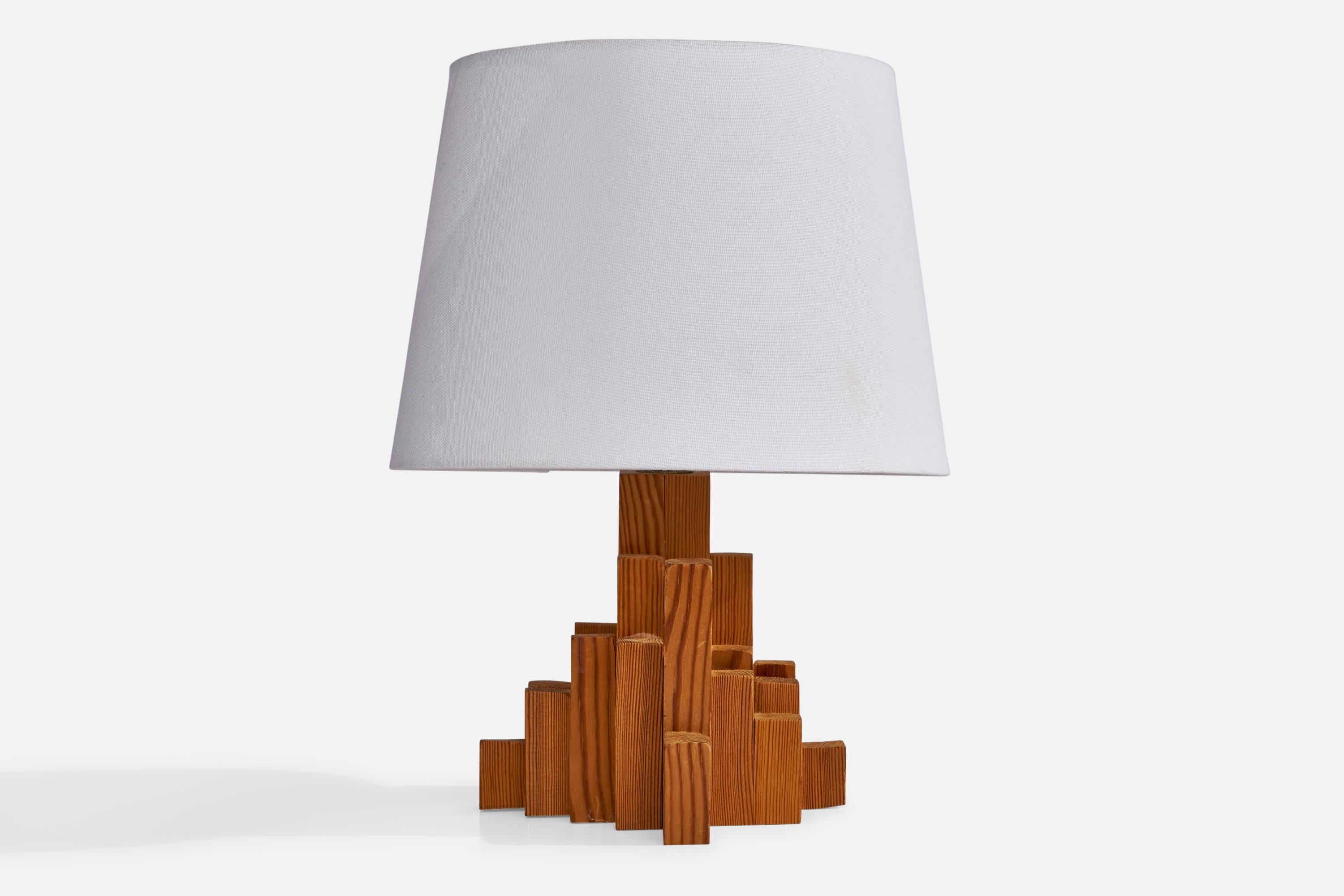 
A freeform pine table lamp designed and produced in Sweden, 1970s.
Dimensions of Lamp (inches): 8.35” H x 6.65” W x 6.9” Depth
Dimensions of Shade (inches): 8” Top Diameter x 10” Bottom Diameter x 7.25” H
Dimensions of Lamp with Shade (inches):
