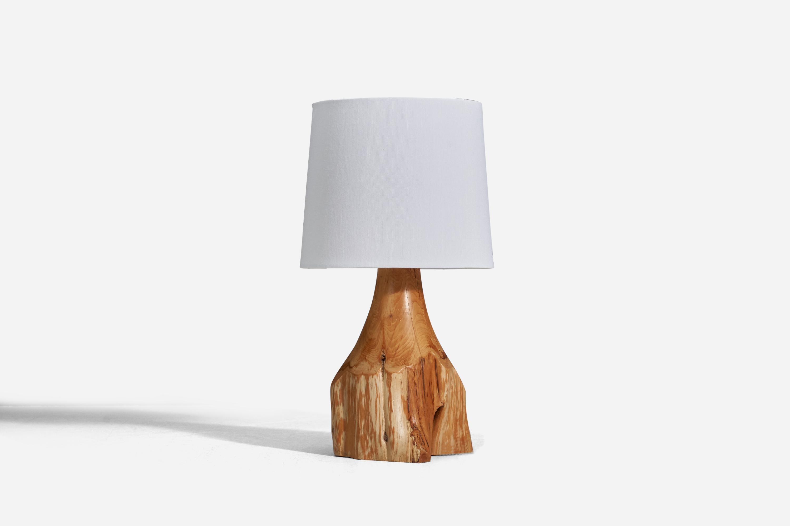 A wooden table lamp designed and produced in Sweden, 1960s. 

Sold without Lampshade
Dimensions of Lamp (inches) : 9.93 x 5.5 x 4.87 (Height x Width x Depth)
Dimensions of Lampshade (inches) : 7 x 8 x 7 (Top Diameter x Bottom Diameter x