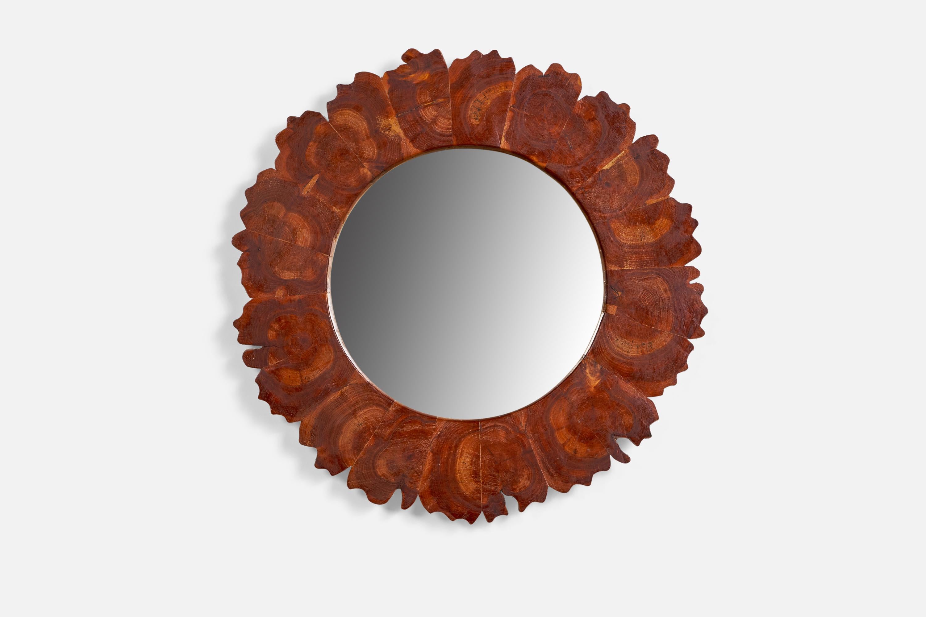 A stained wood mirror designed and produced in Sweden, 1960s.