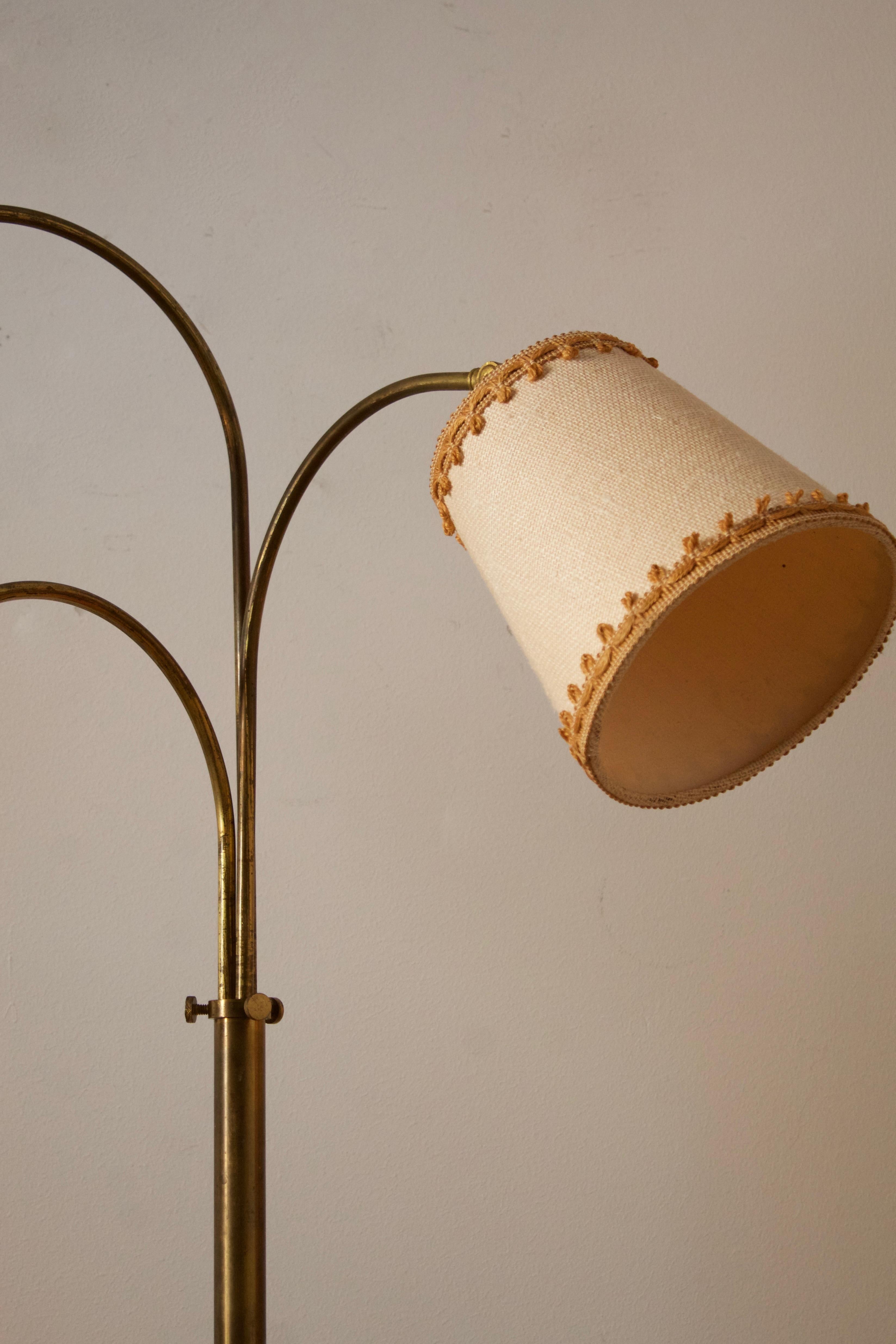 An adjustable three-armed functionalist floor lamp. With adjustable arms. Brand new Swedish-made lampshades.

Dimensions variable.

Other designers of the period include Josef Frank, Paavo Tynell, Hans Agne Jacobsen, and Alvar Aalto.