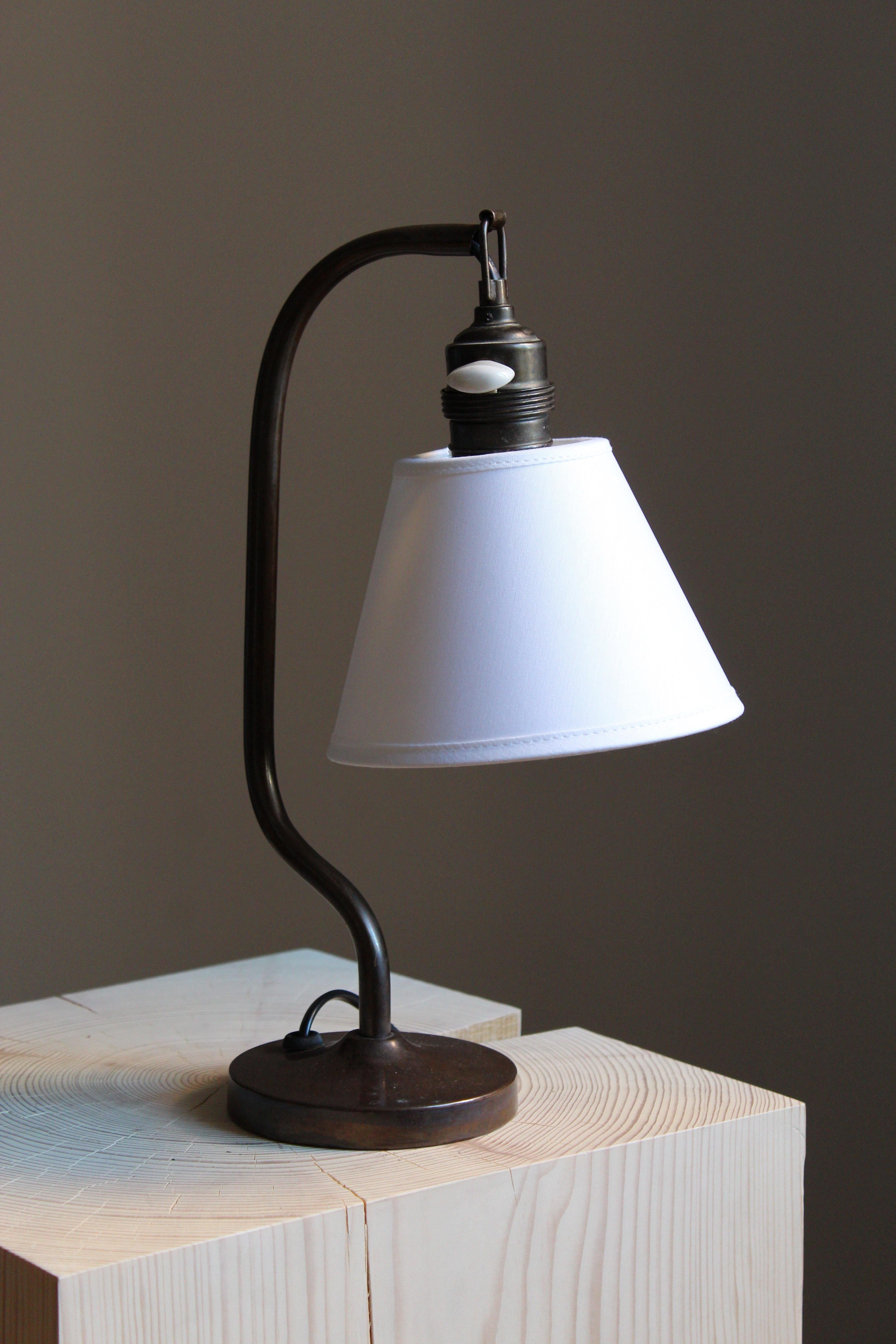 A table light or desk lamp. By an unknown Swedish designer and producer. In patinated brass. Sold without lampshade.

Other designers of the period include Poul Henningsen, Hans Bergström, Kaare Klint, Jean Royere, and Paavo Tynell.