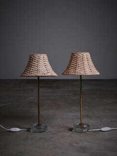 Swedish designer glass, brass and rattan table lamps by EAE, 1960s