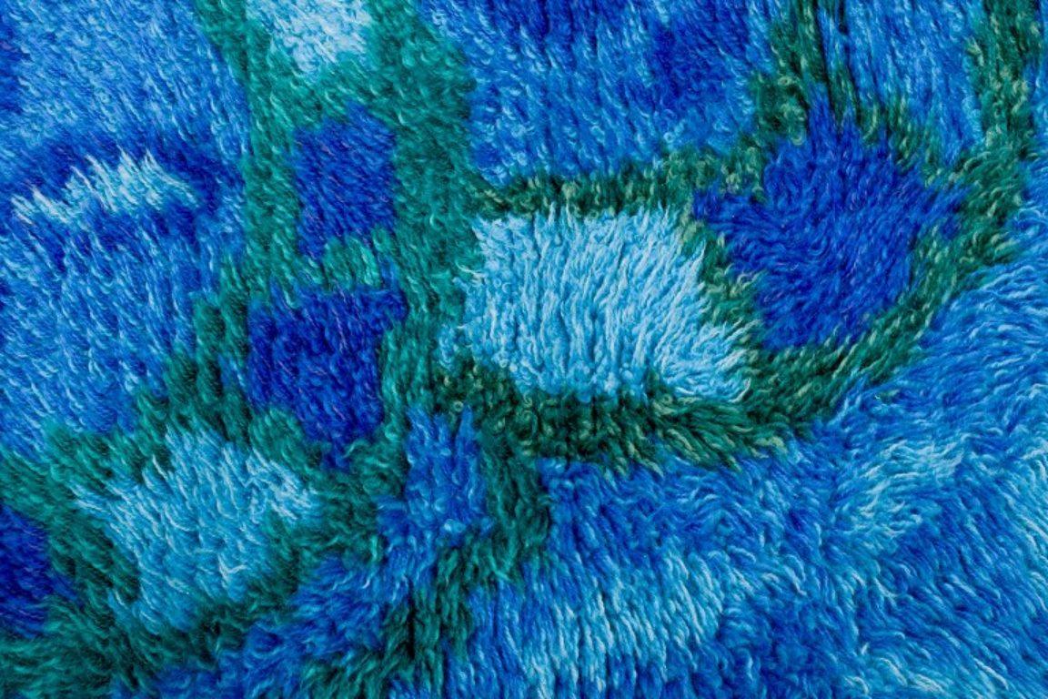 Late 20th Century Swedish designer, handwoven rya carpet with geometric pattern. For Sale