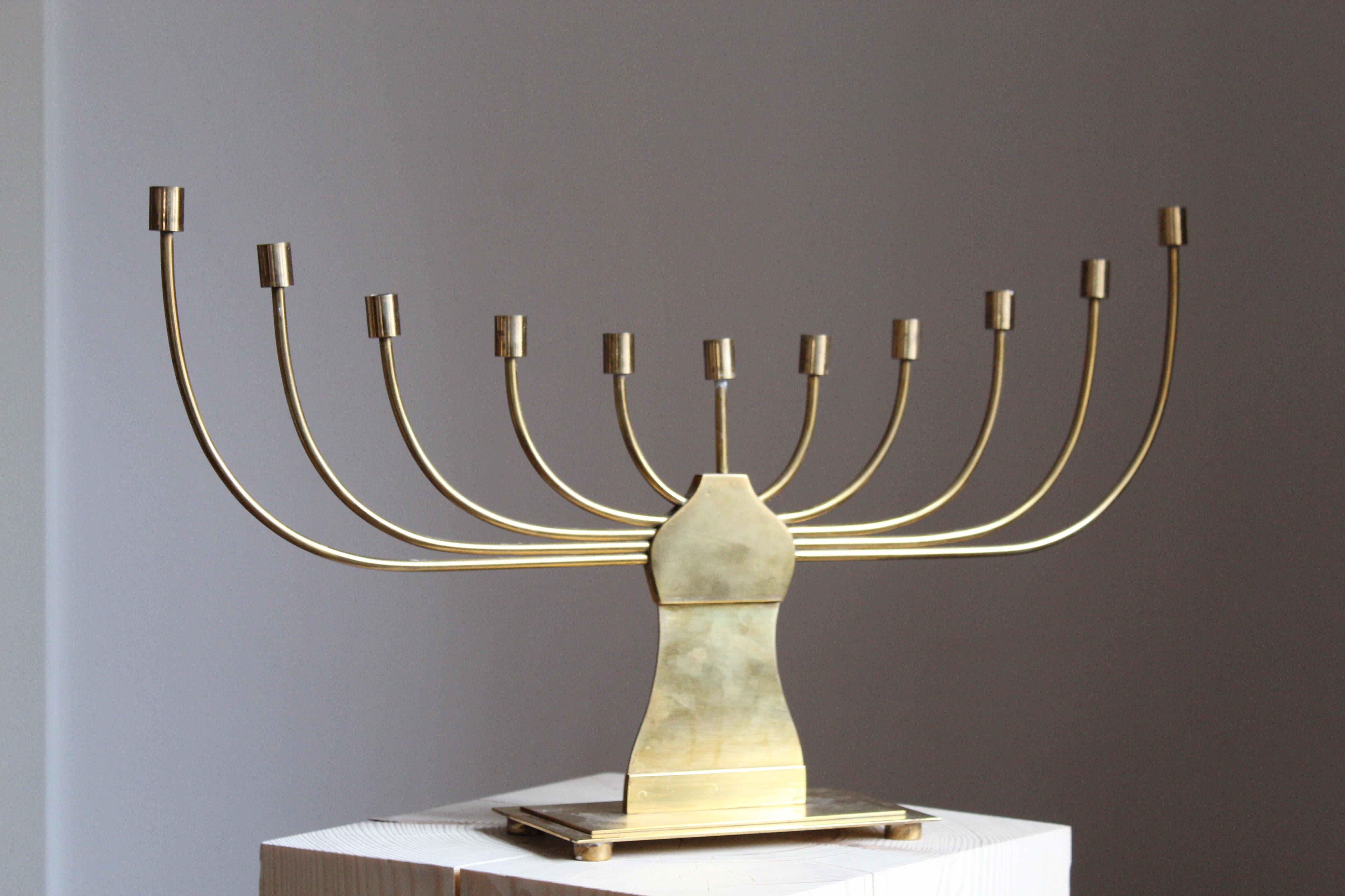 A large candelabra, Sweden, 1950s. In brass. For small candles.

Other designers of the period include Piet Hein, Paavo Tynell, Josef Frank, and Jean Royere.

  
