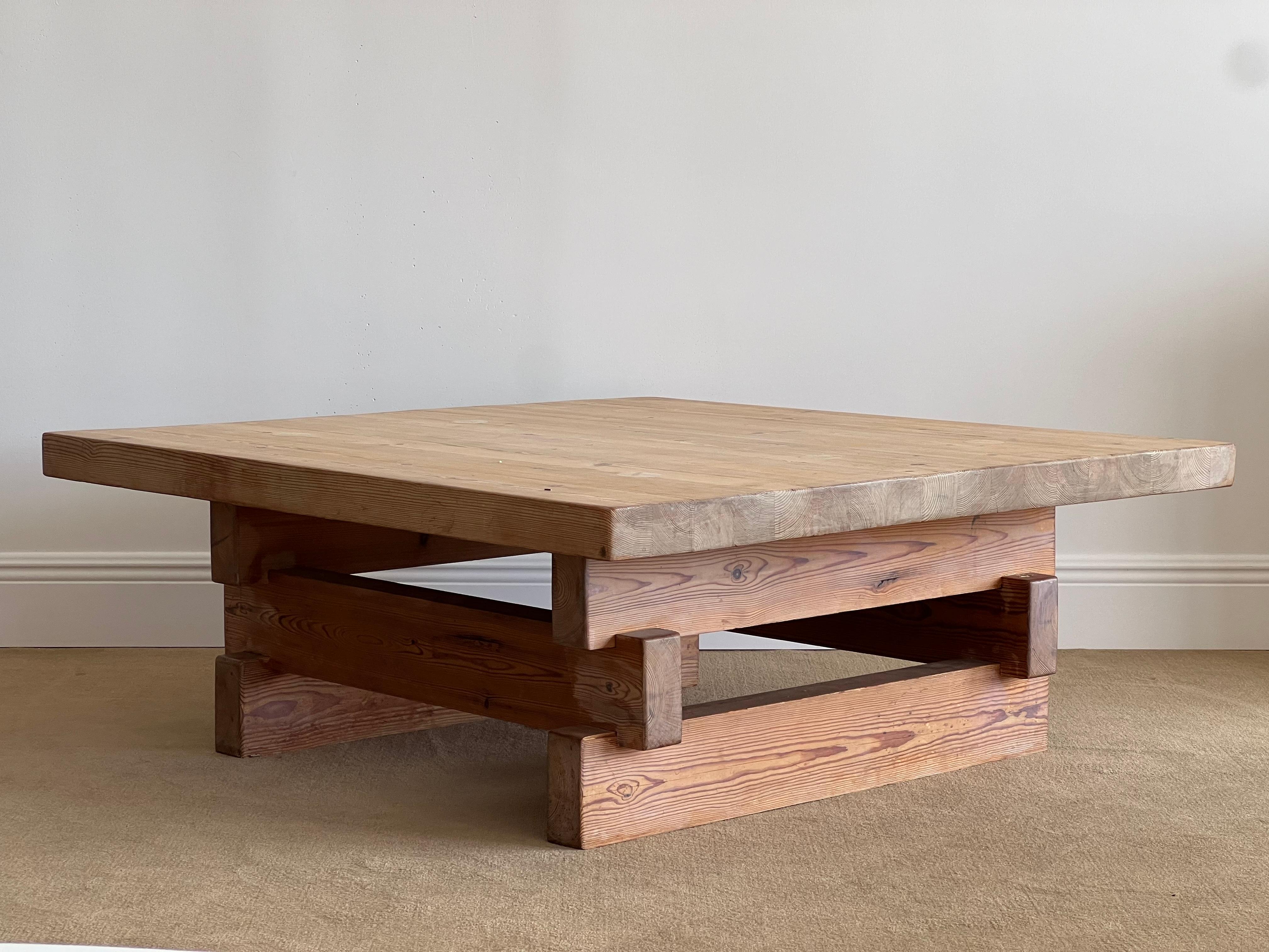 A large square pine coffee table designed and produced in Sweden, 1970s.