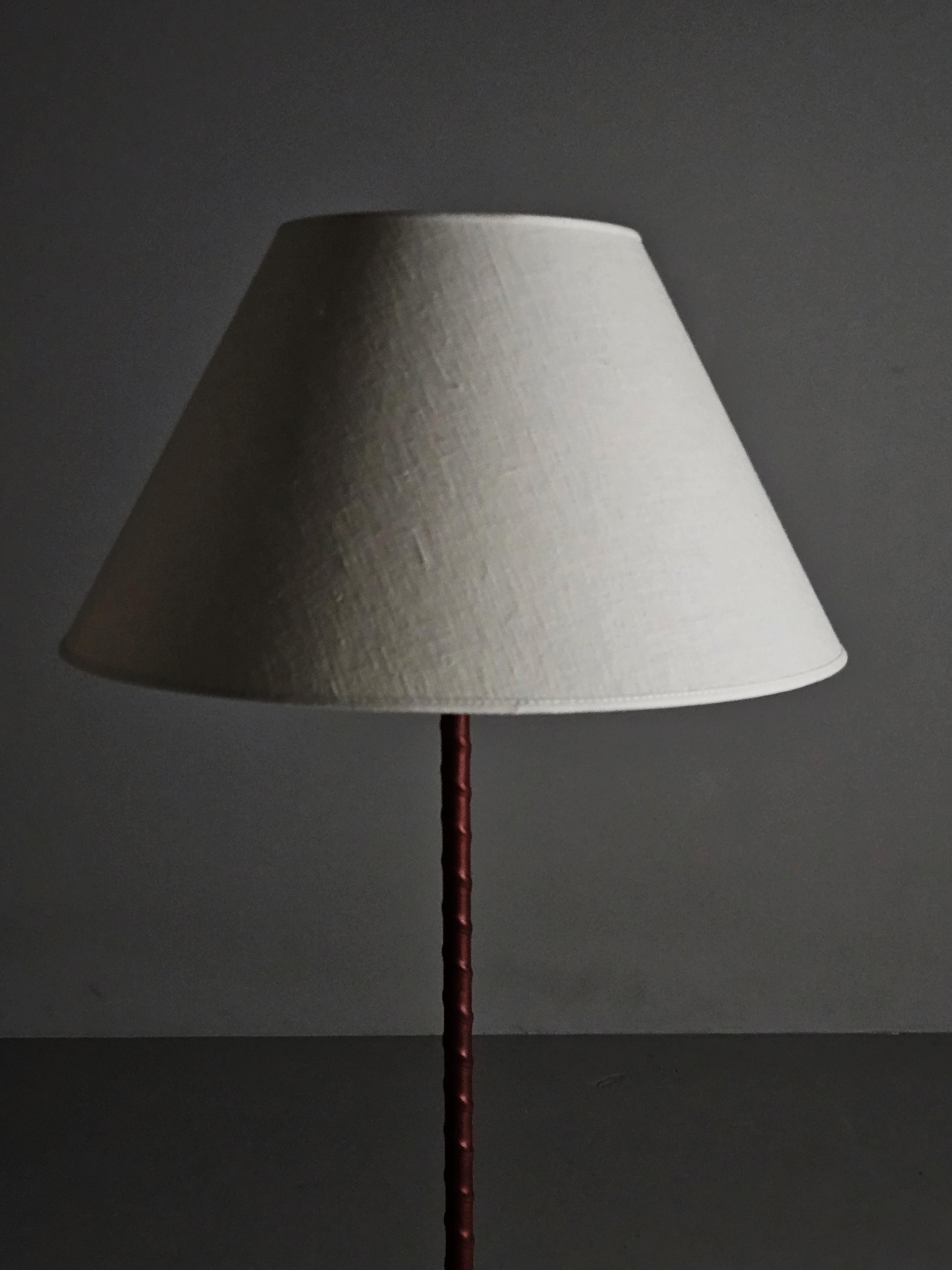 20th Century Swedish designer leather and brass floor lamps by MAE, Sweden, 1950s