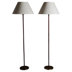 Swedish designer leather and brass floor lamps by MAE, Sweden, 1950s