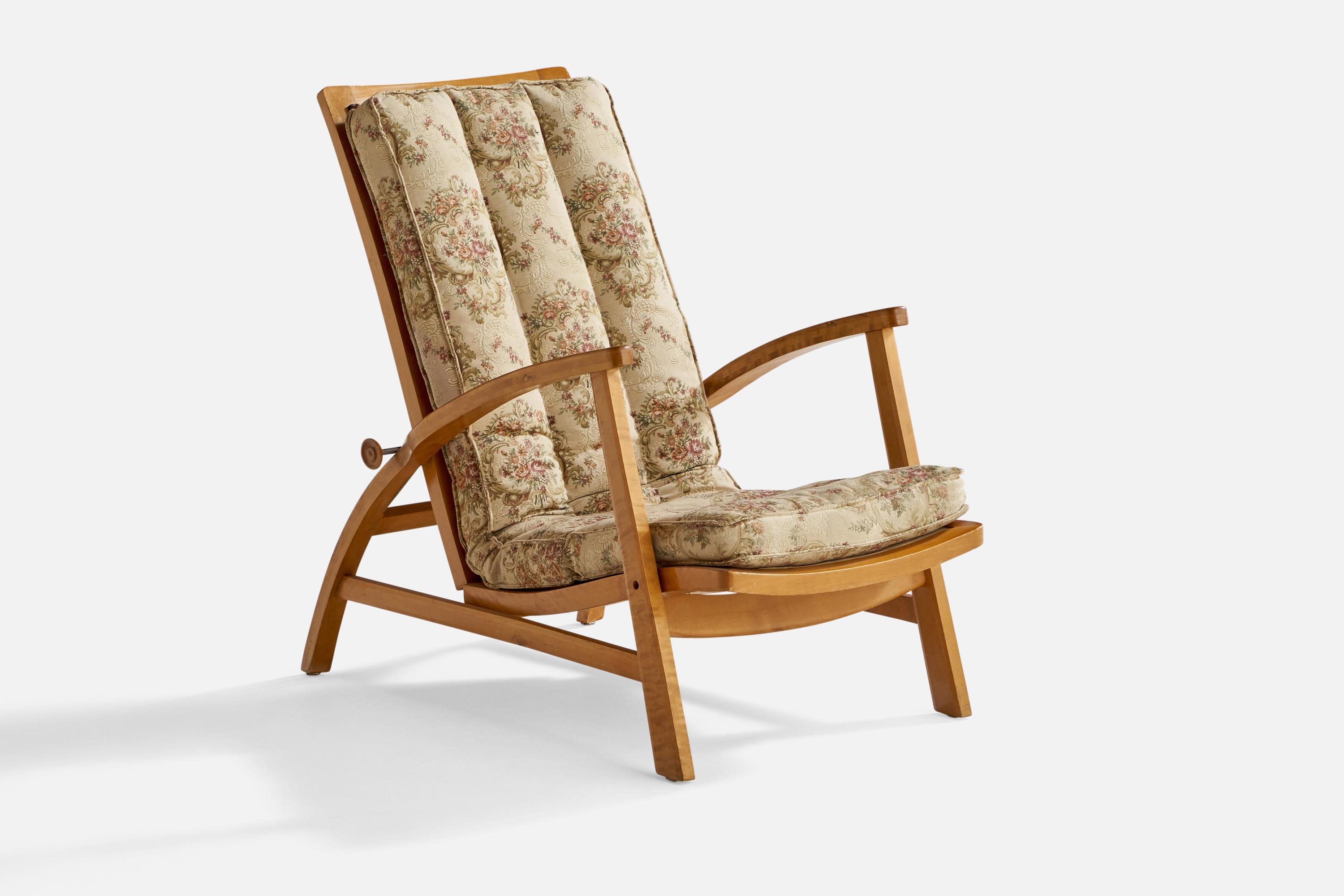 An adjustable birch and floral printed fabric lounge chair designed and produced in Sweden, 1940s.

Seat height: 14.5”
