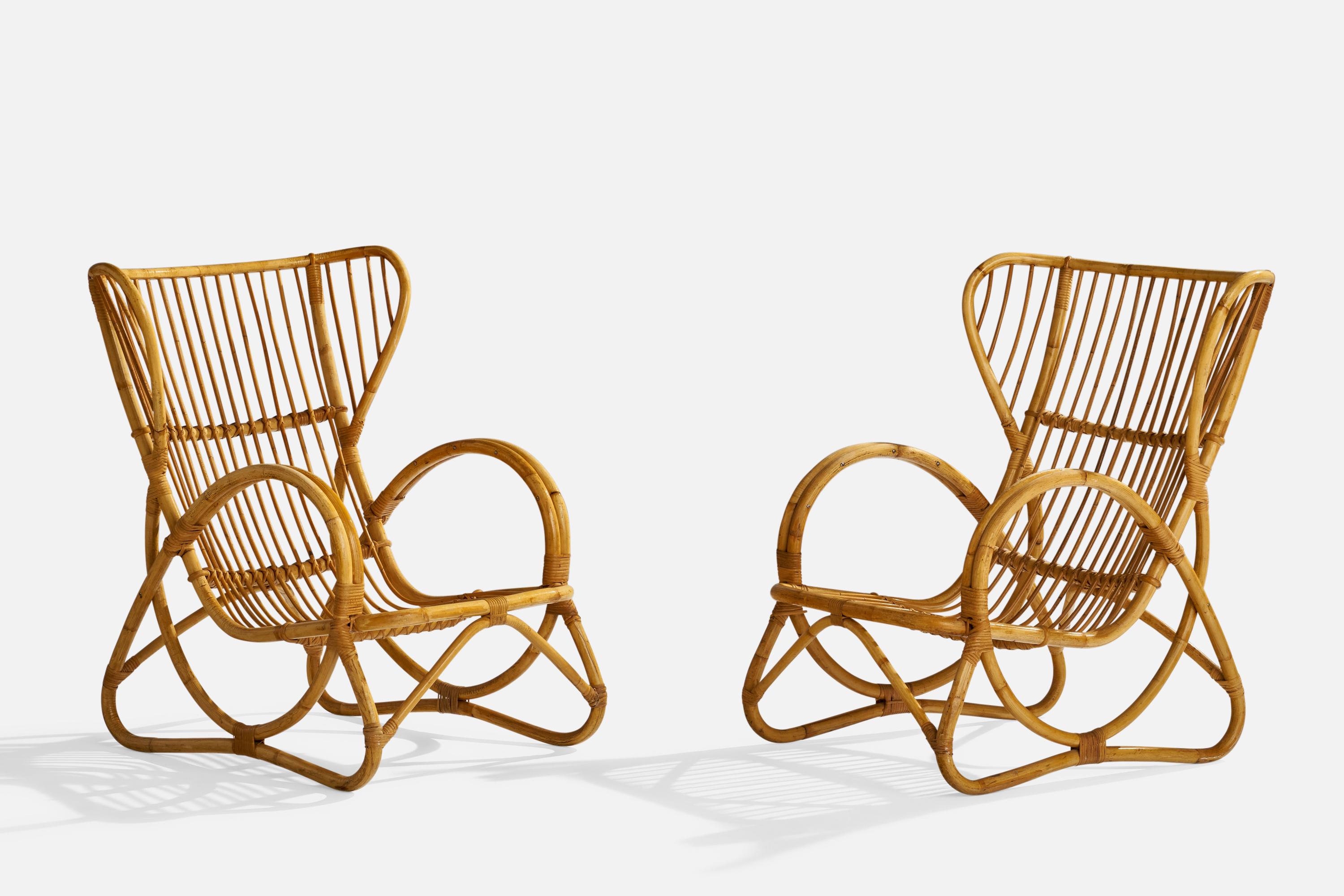 A pair of bamboo and rattan lounge chairs designed and produced in Sweden, 1950s.

Seat height 12.5”