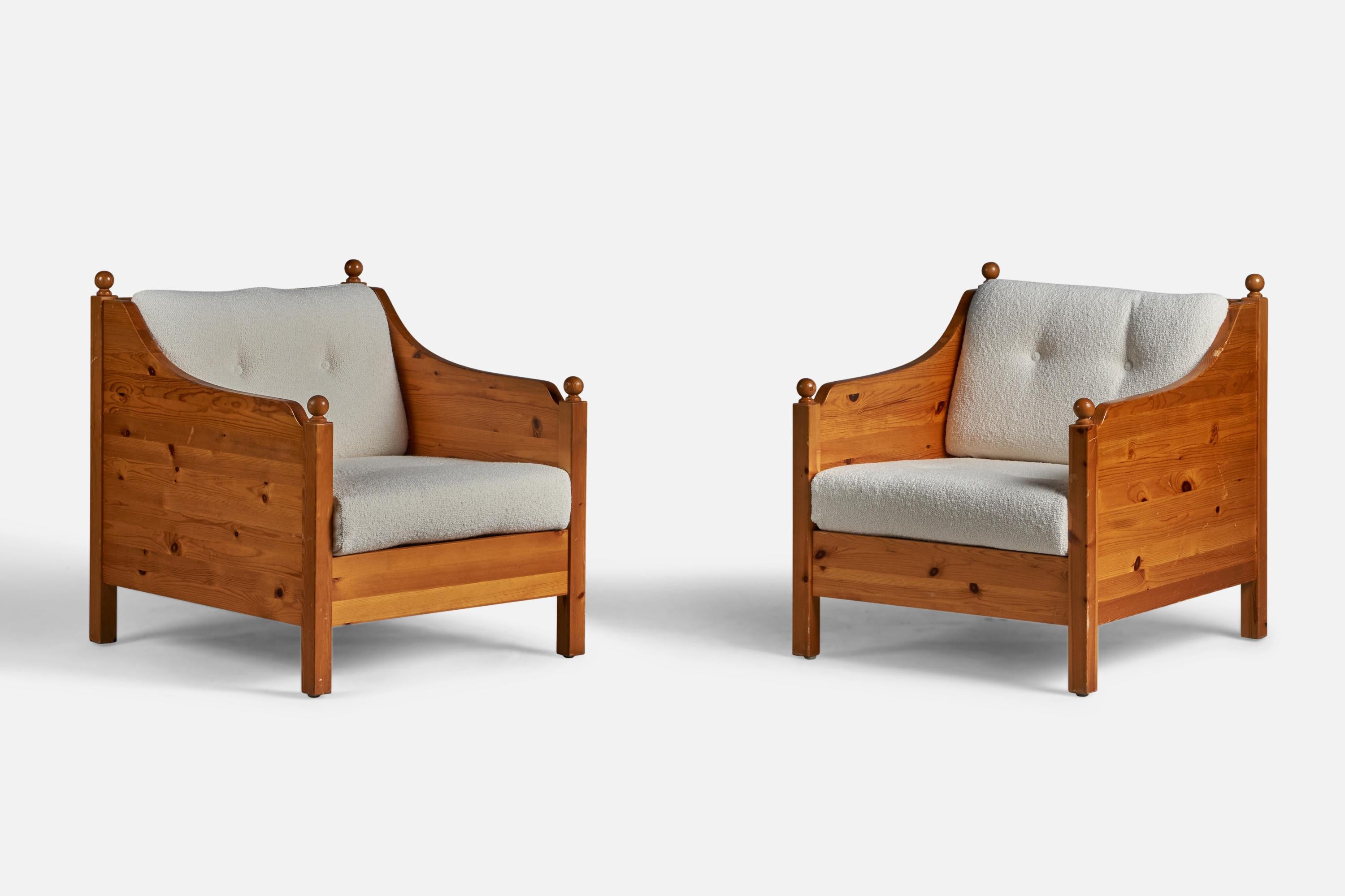 A pair of solid pine and white bouclé fabric lounge chairs, designed and produced in Sweden, 1970s.

15