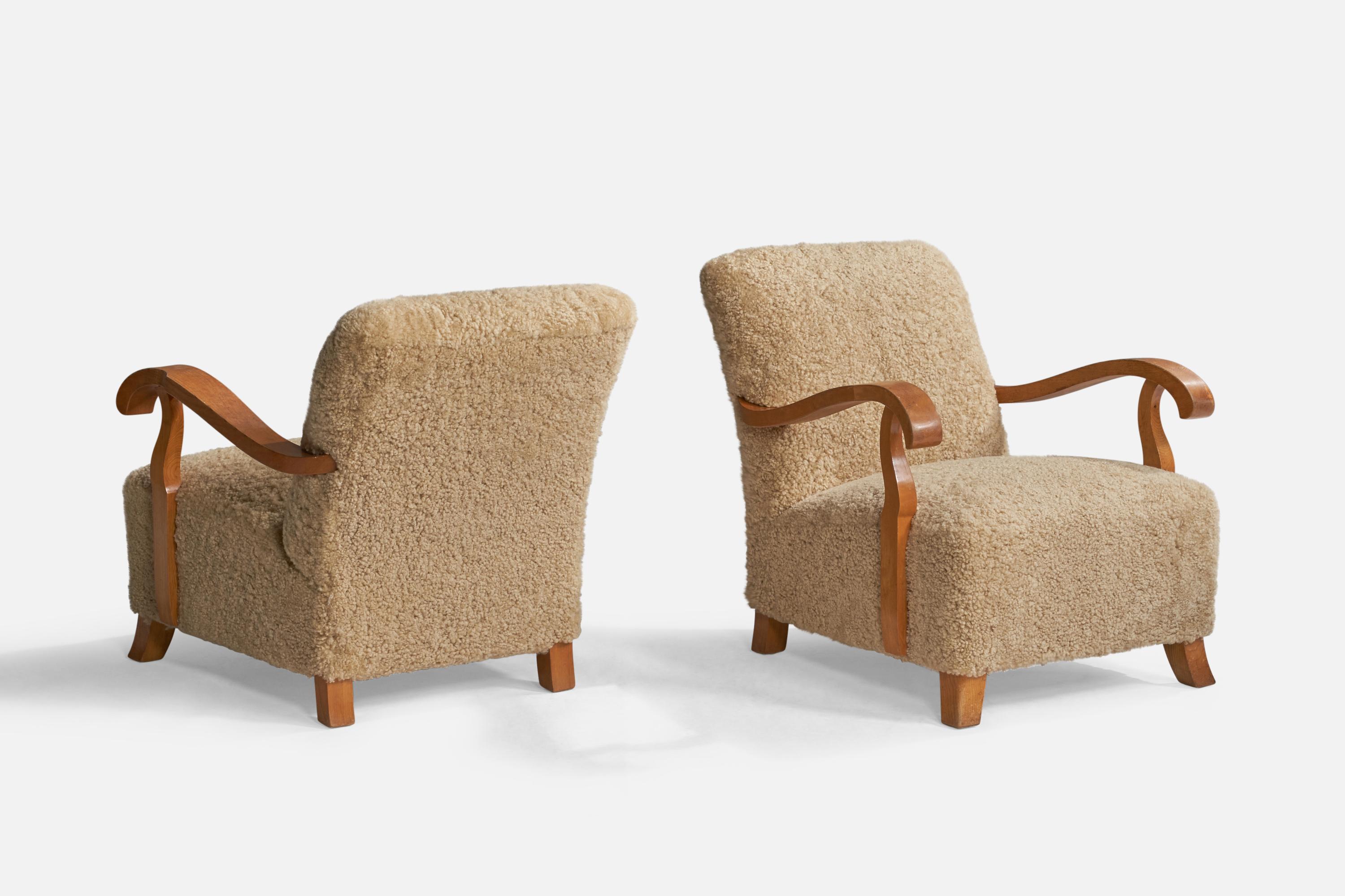 Scandinavian Modern Swedish Designer, Lounge Chairs, Shearling, Oak, Sweden, 1940s