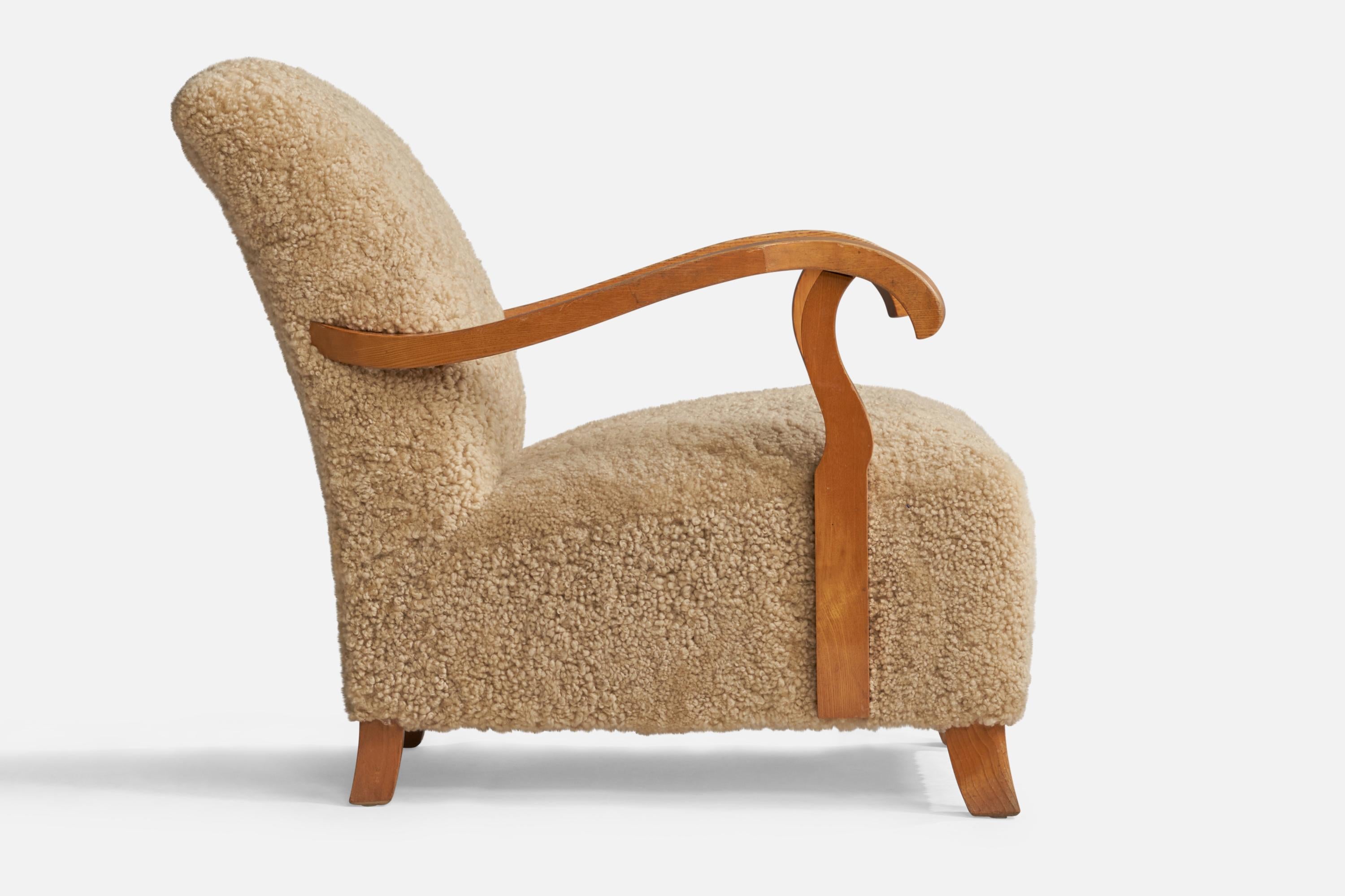 Mid-20th Century Swedish Designer, Lounge Chairs, Shearling, Oak, Sweden, 1940s