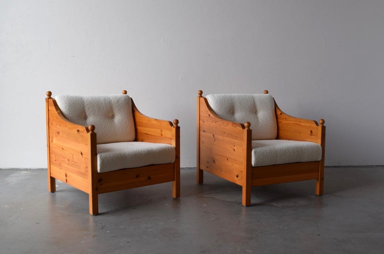 A pair of lounge chairs. Designed and produced in Sweden, 1970s. Cushions reupholstered in brand new high-end bouclé fabric.

Other designers of the period include Pierre Chapo, Axel Einar Hjorth, Charlotte Perriand, and George Nakashima.