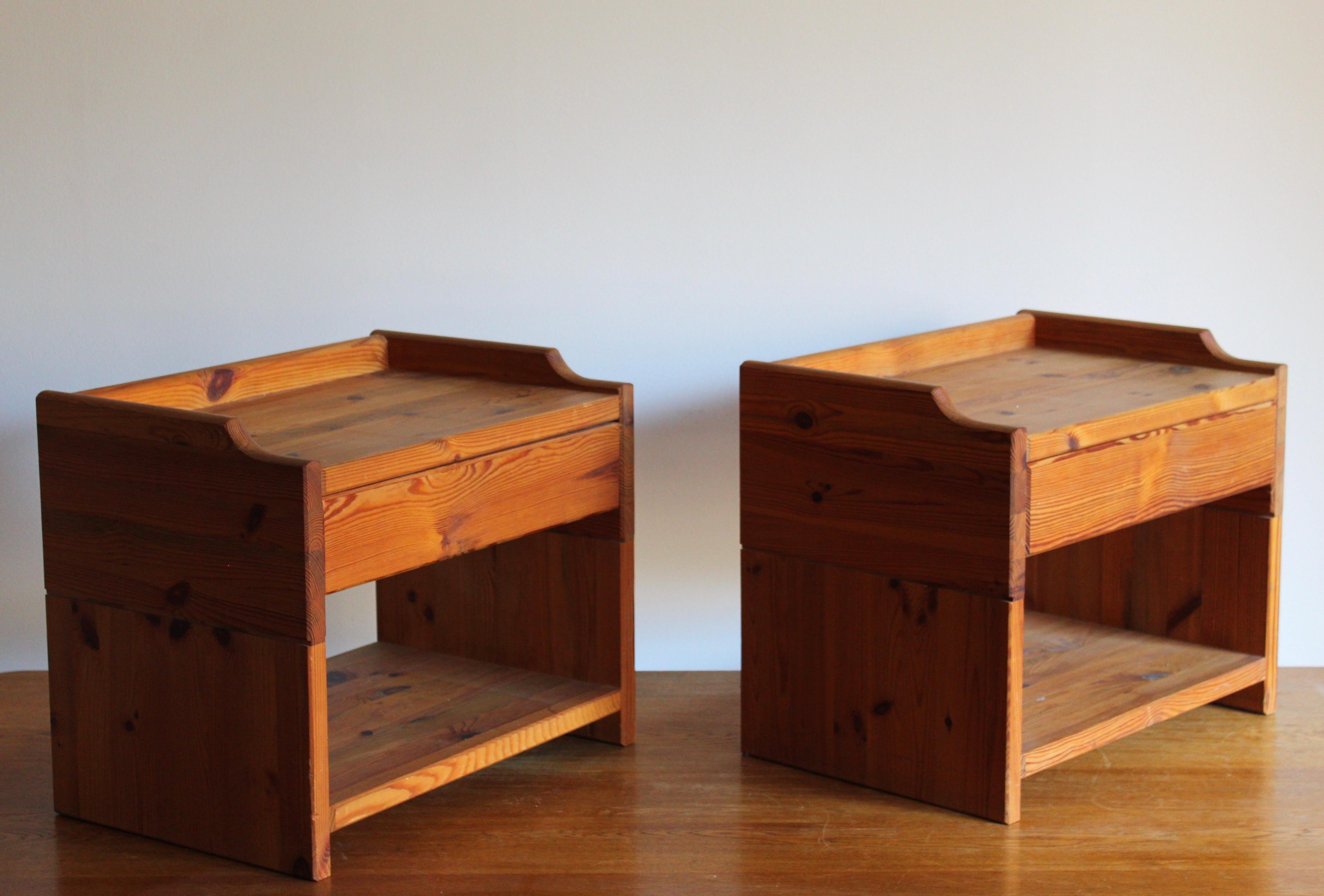 A set of bedside cabinets / tables / nightstands. Designed and produced in Sweden, 1970s. In solid pine.

Other designers working in similar style and materials include Axel Einar Hjorth, Roland Wilhelmsson, Pierre Chapo, and Charlotte Perriand.