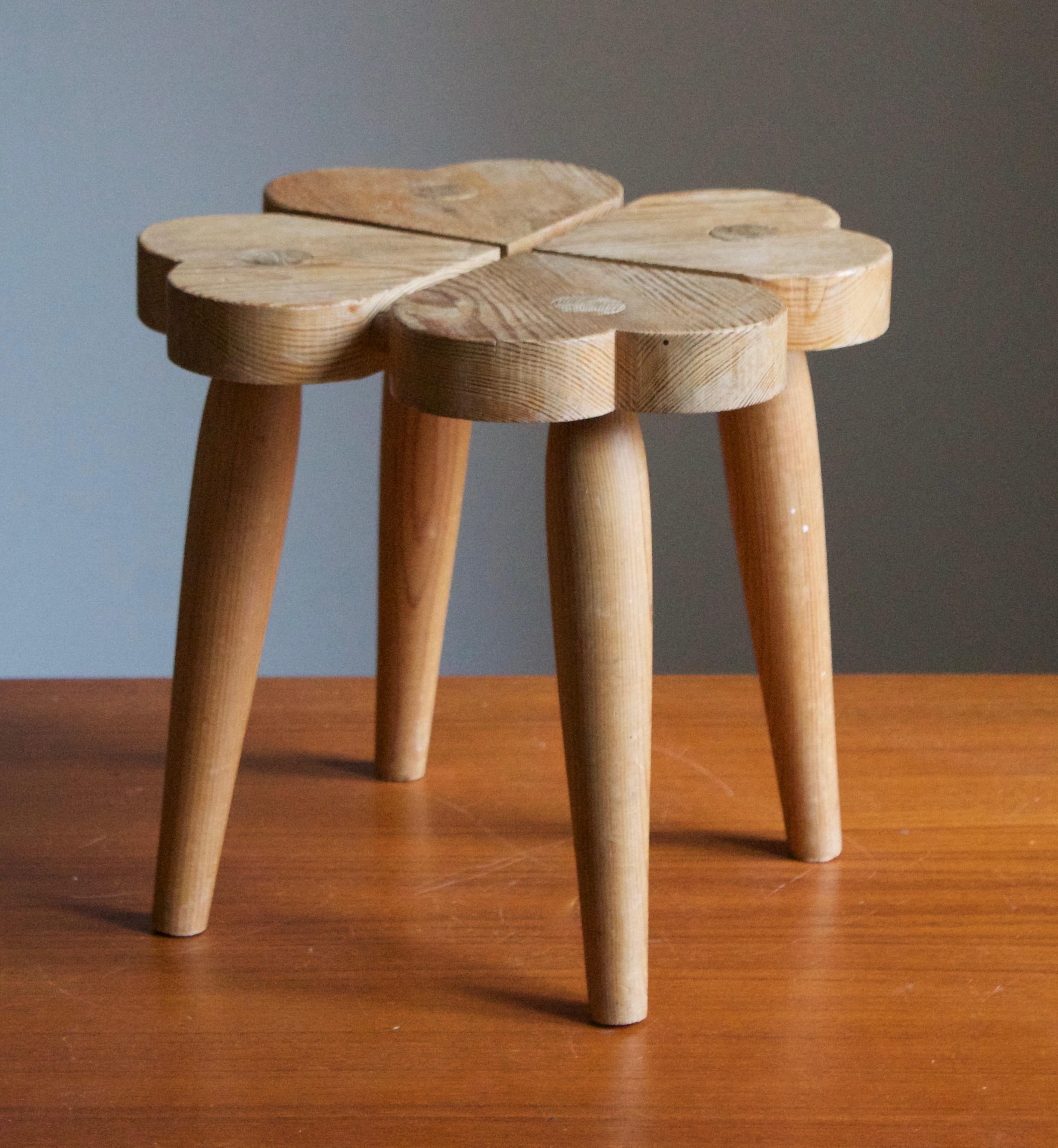 A Swedish pinewood stool. By unknown designer, 1970s.





