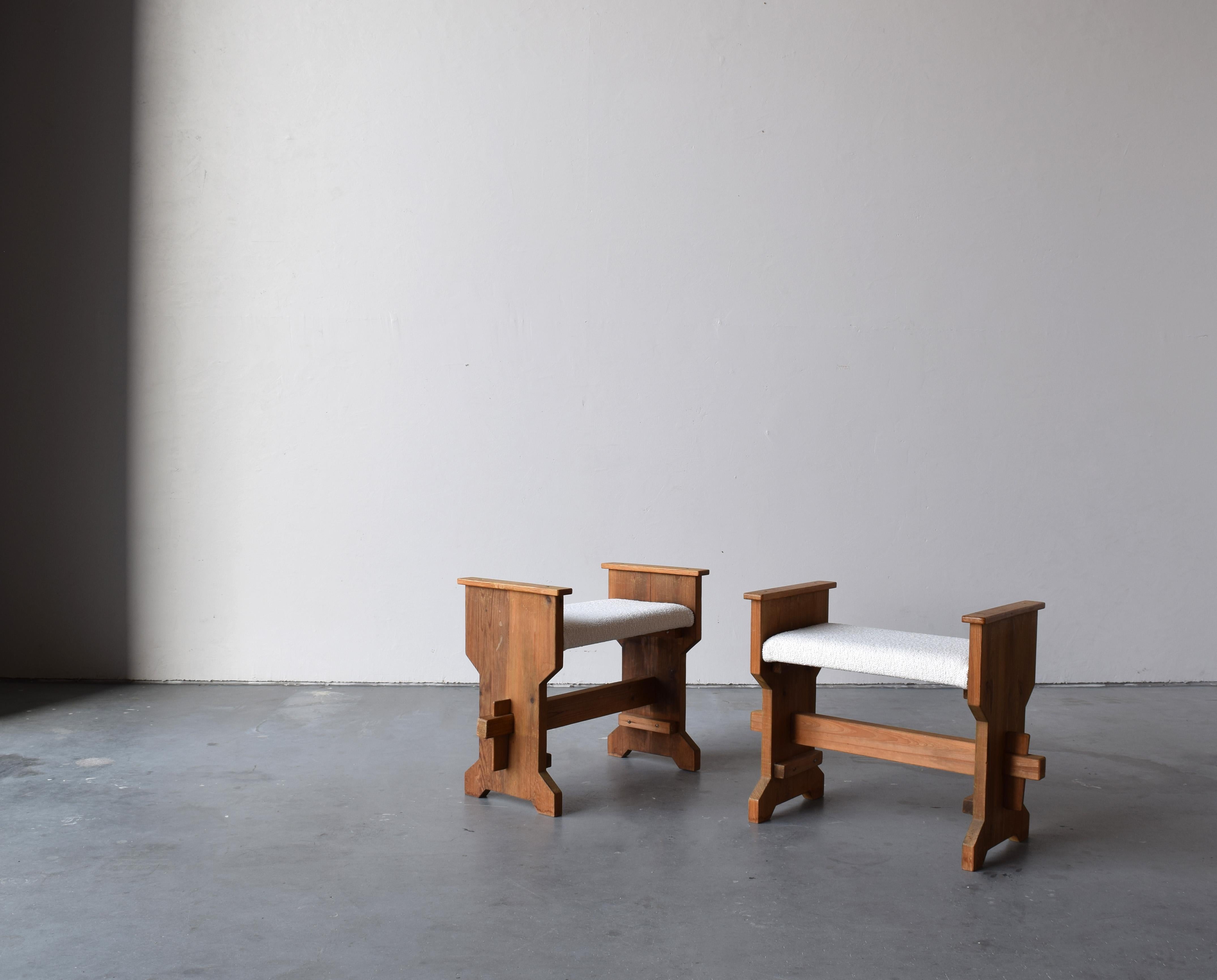 A pair of Swedish pinewood stools. By unknown designer, 1970s. Features revealed joinery, metal nails, and reupholstered in brand new high-end bouclé fabric sourced in Sweden.





  