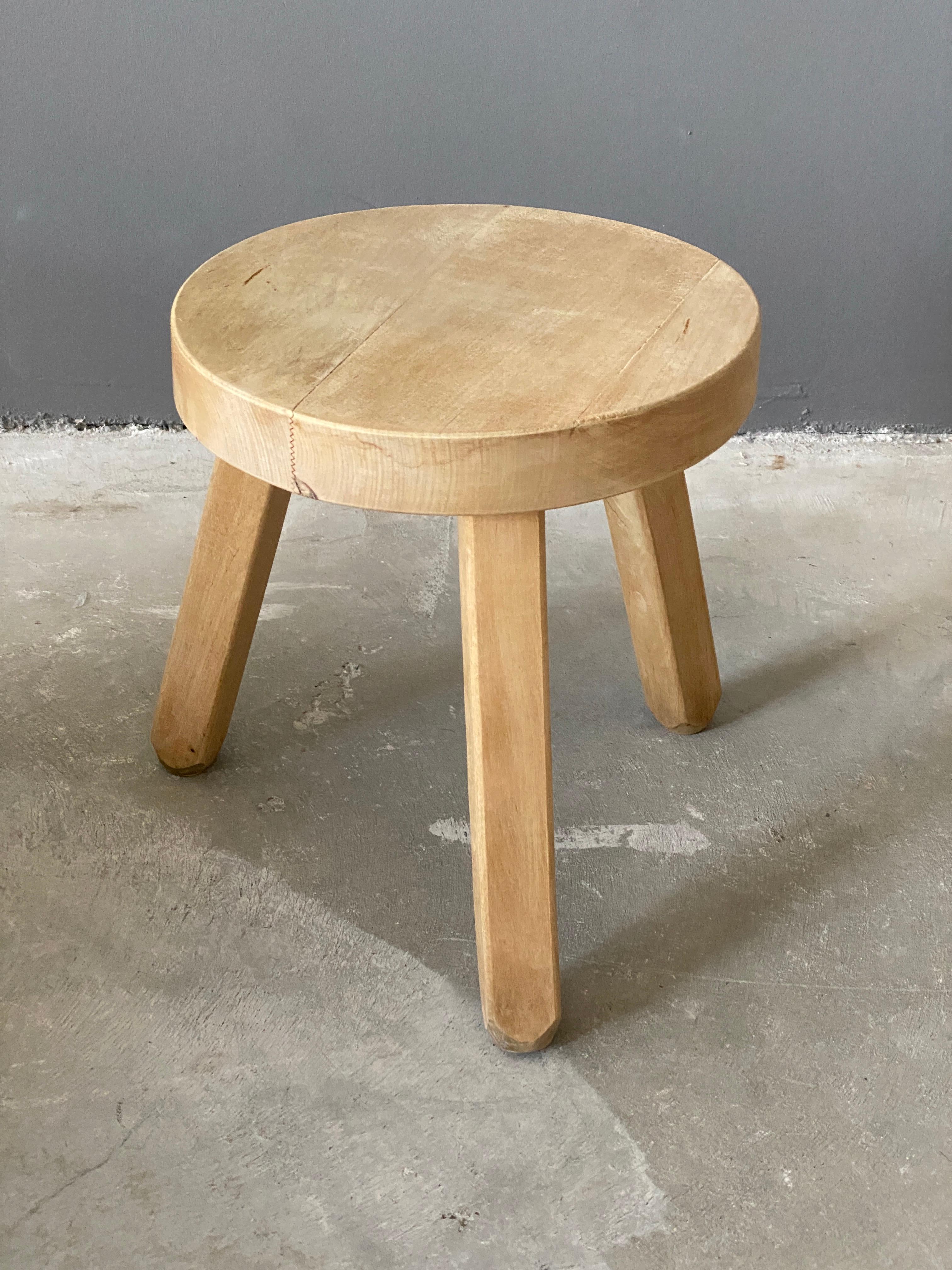 A Handmade Minimalist stool, designed and produced in Sweden, 1970s. In finely sculpted solid oak. 

Other designers of the 20th century working in pine include Charlotte Perriand, Lisa-Johansson Pape, Pierre Chapo, and Axel Einar Hjorth.