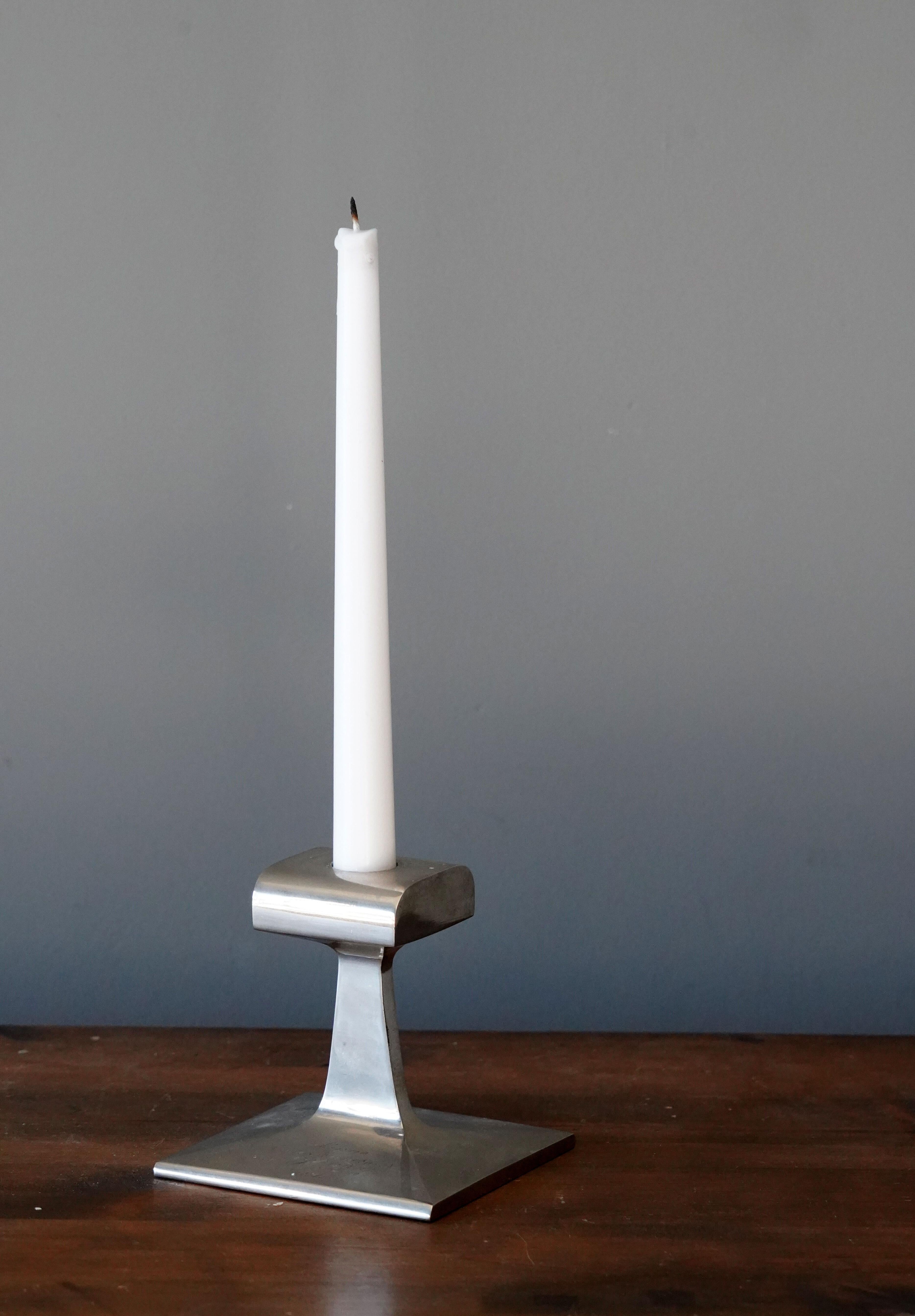 A unique modernist candlestick. Engraved with dedication in Swedish and dated 1/4, 1917.

   
