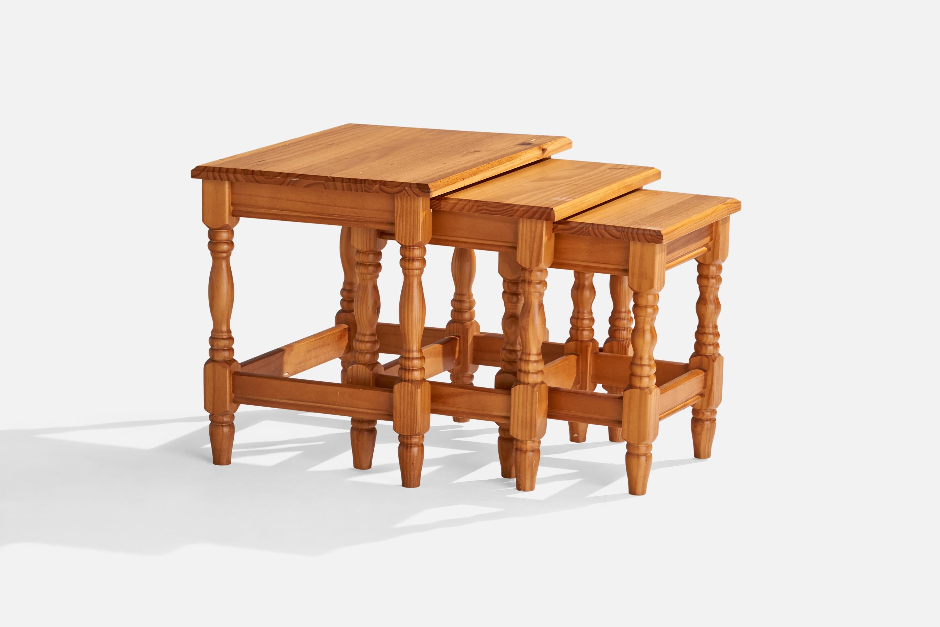 A set of three pine nesting tables designed and produced in Sweden, c. 1970s.

Size on medium table: 17.75”H x 17.625”W x 14.25”D
Size on smallest table: 16.5”H x 13.5”W x 11.5”D