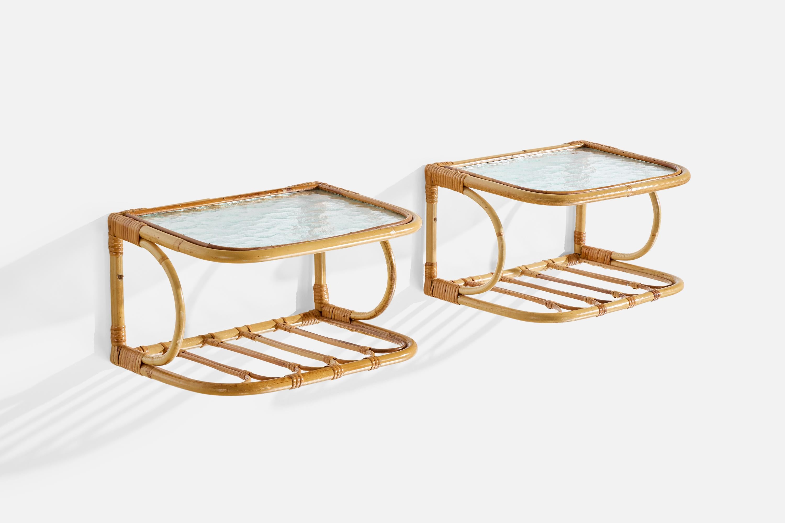 A pair of wall-mounted bamboo, rattan and glass nightstands designed and produced in Sweden, c. 1950s.

Wear consistent with age and use

Overall Dimensions (inches): 9.5