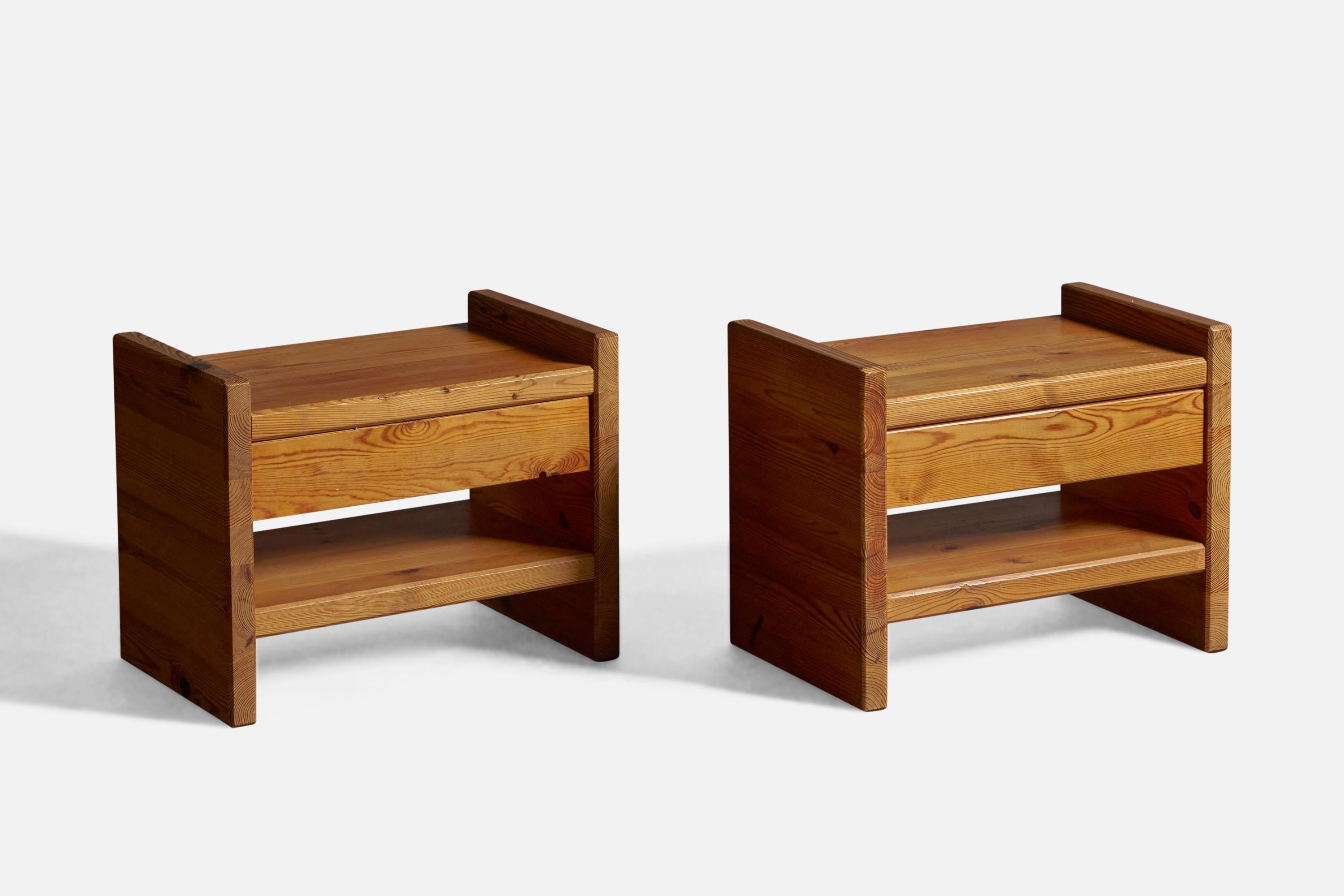 A pair of solid pine nightstands or bedside cabinets, designed and produced in Sweden, 1970s.
