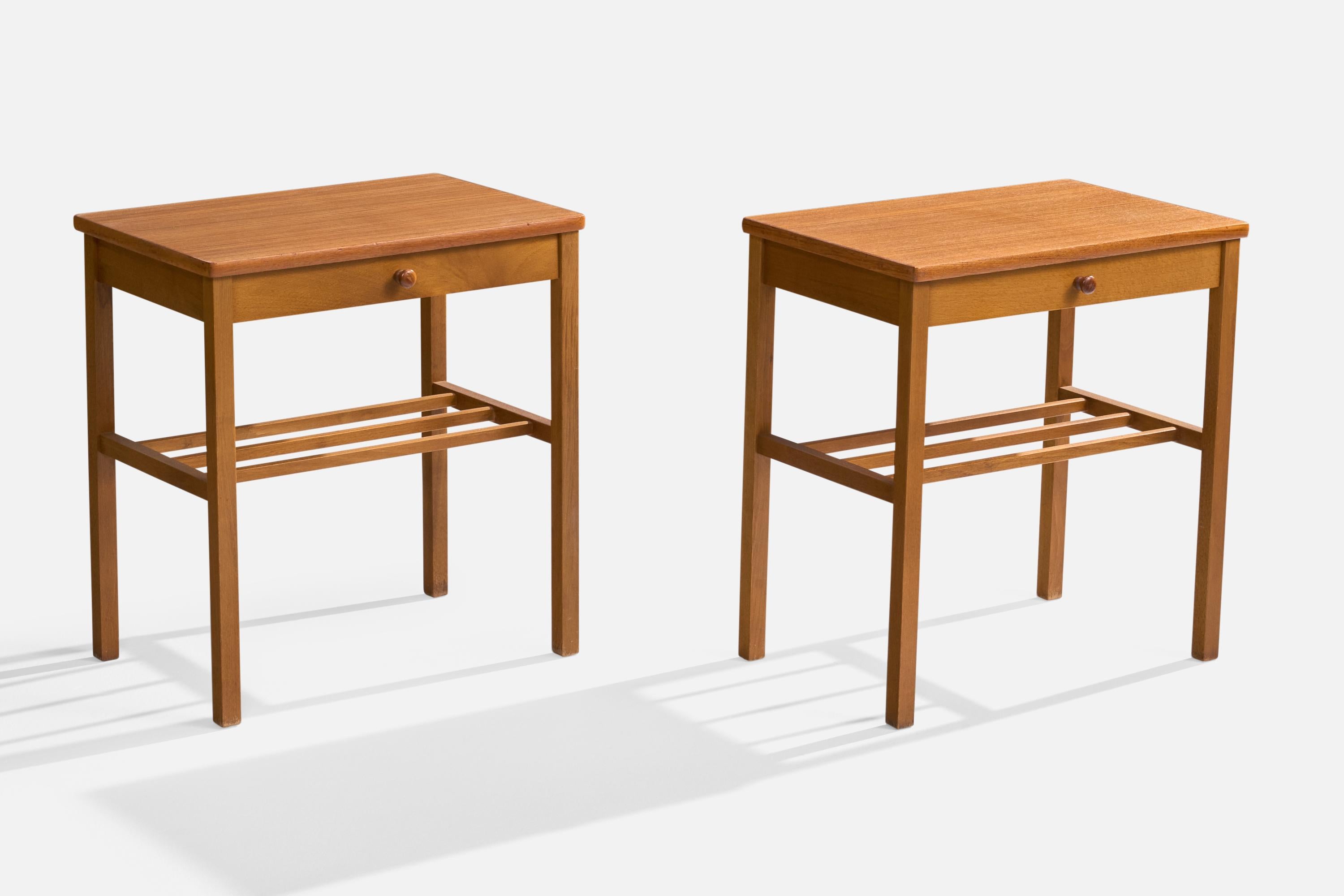 A pair of teak nightstands designed and produced in Sweden, c. 1950s.

Dimensions: 20.125” H x 18.8” W x 12.6” D