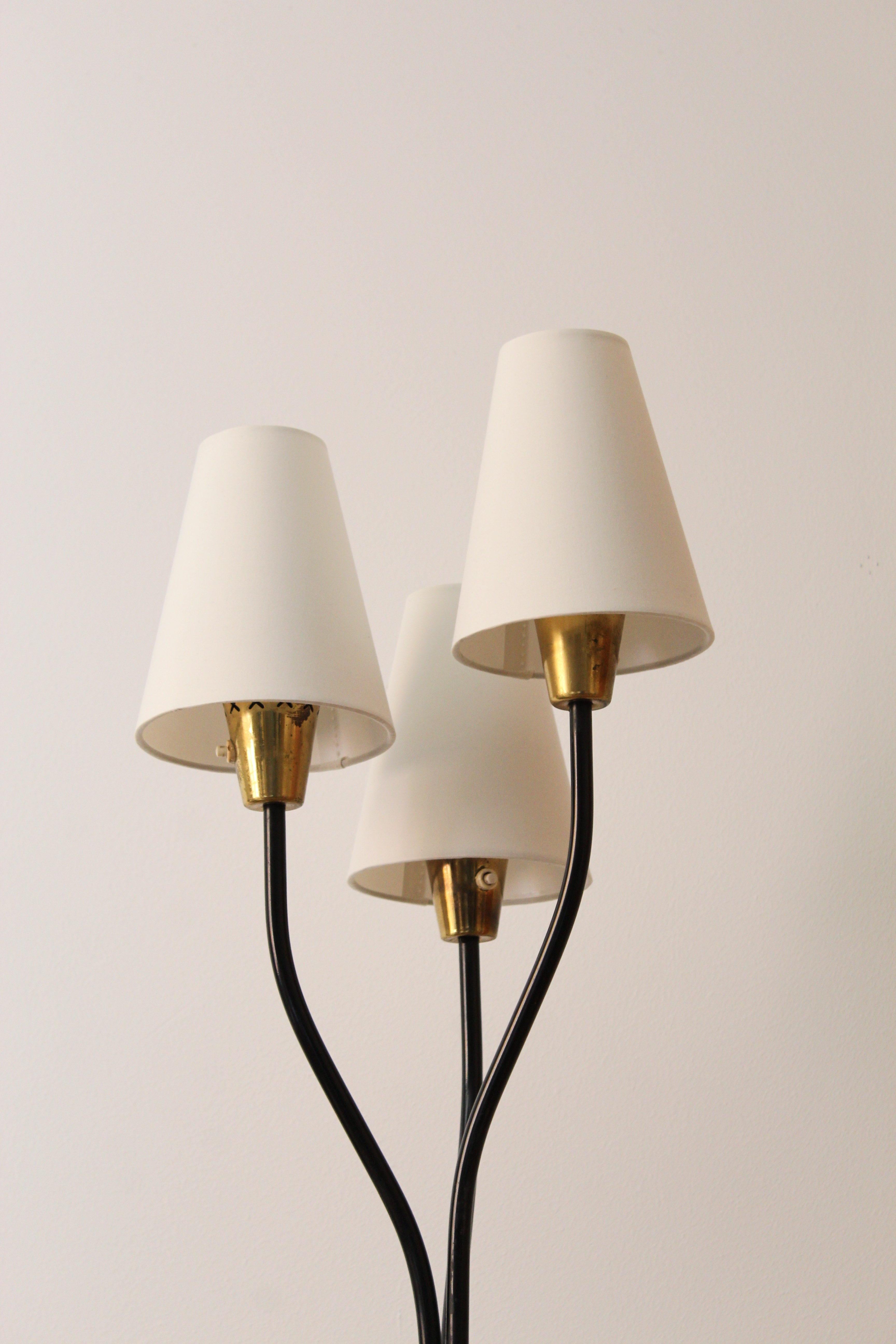 An organic 3-armed floor lamp. Produced and designed in Sweden, 1950s. 

Other designers working in the organic style include Jean Royere, Gio Ponti, Vladimir Kagan, Ico Parisi, and George Nakashima.