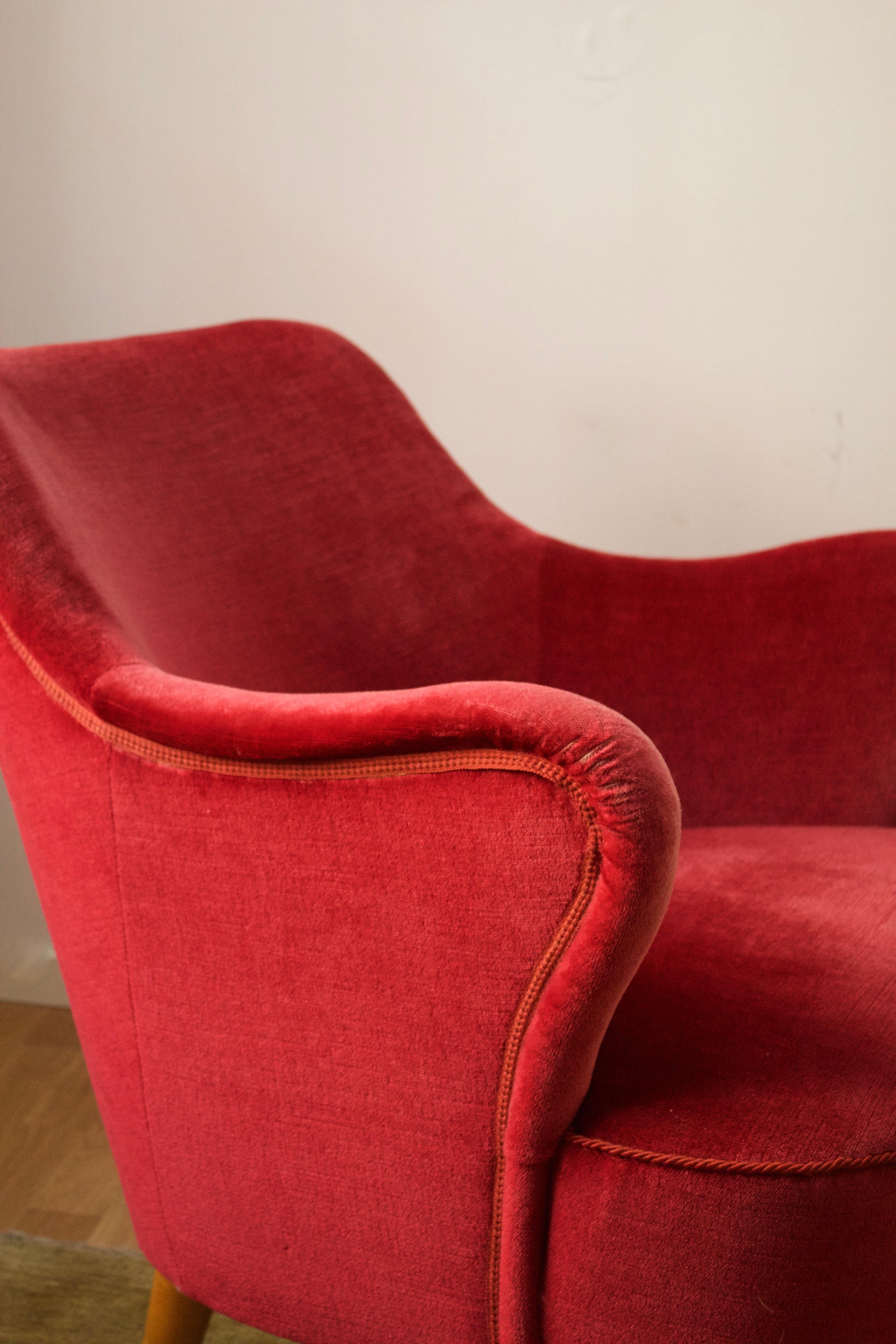 An organic lounge chair. Designed and produced in Sweden, 1940s. Features vintage velvet upholstery in fair condition.

Other designers of the period include Carl Malmsten, Kerstin Hörlin-Holmquist, Flemming Lassen, Gio Ponti, and Vladimir Kagan.