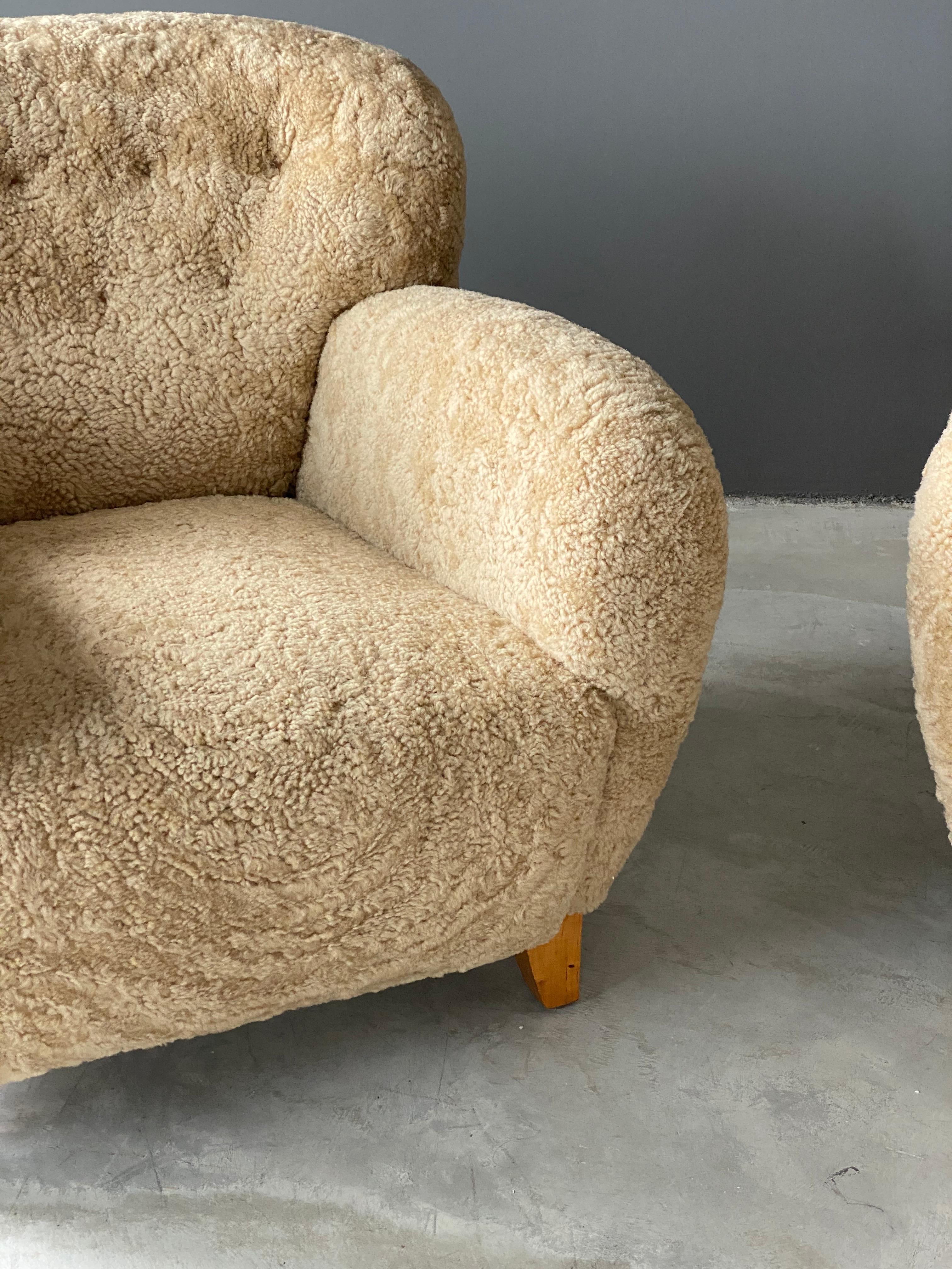 Swedish Designer, Organic Lounge Chairs, Sheepskin, Stained Wood, Swedish, 1940s In Good Condition In High Point, NC