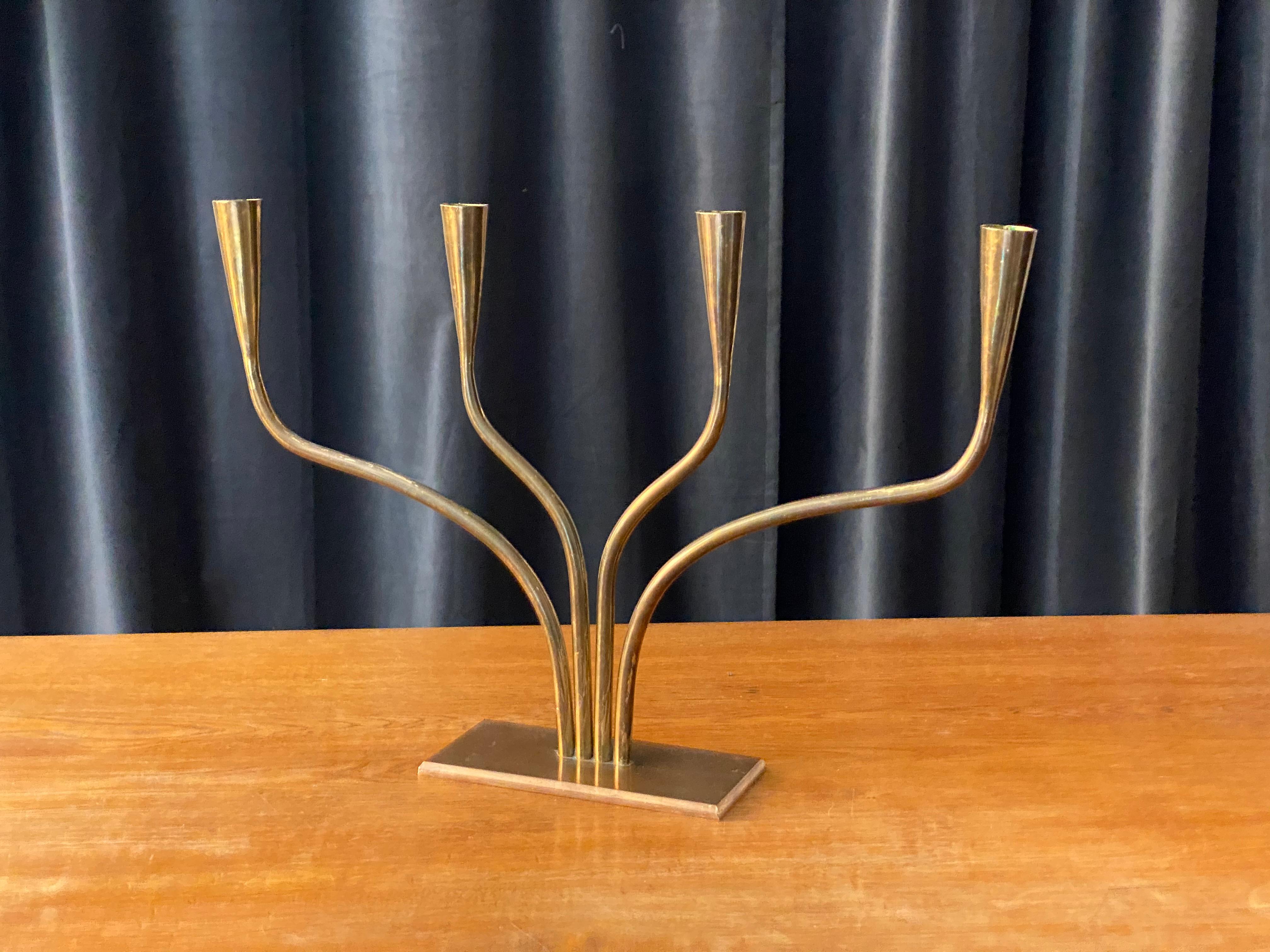 A highly modern and Minimalist candelabrum. Designed and produced in Sweden, 1940s.

Other designers of the period include Paavo Tynell, Piet Hein, G.A. Berg and Jean Royère.