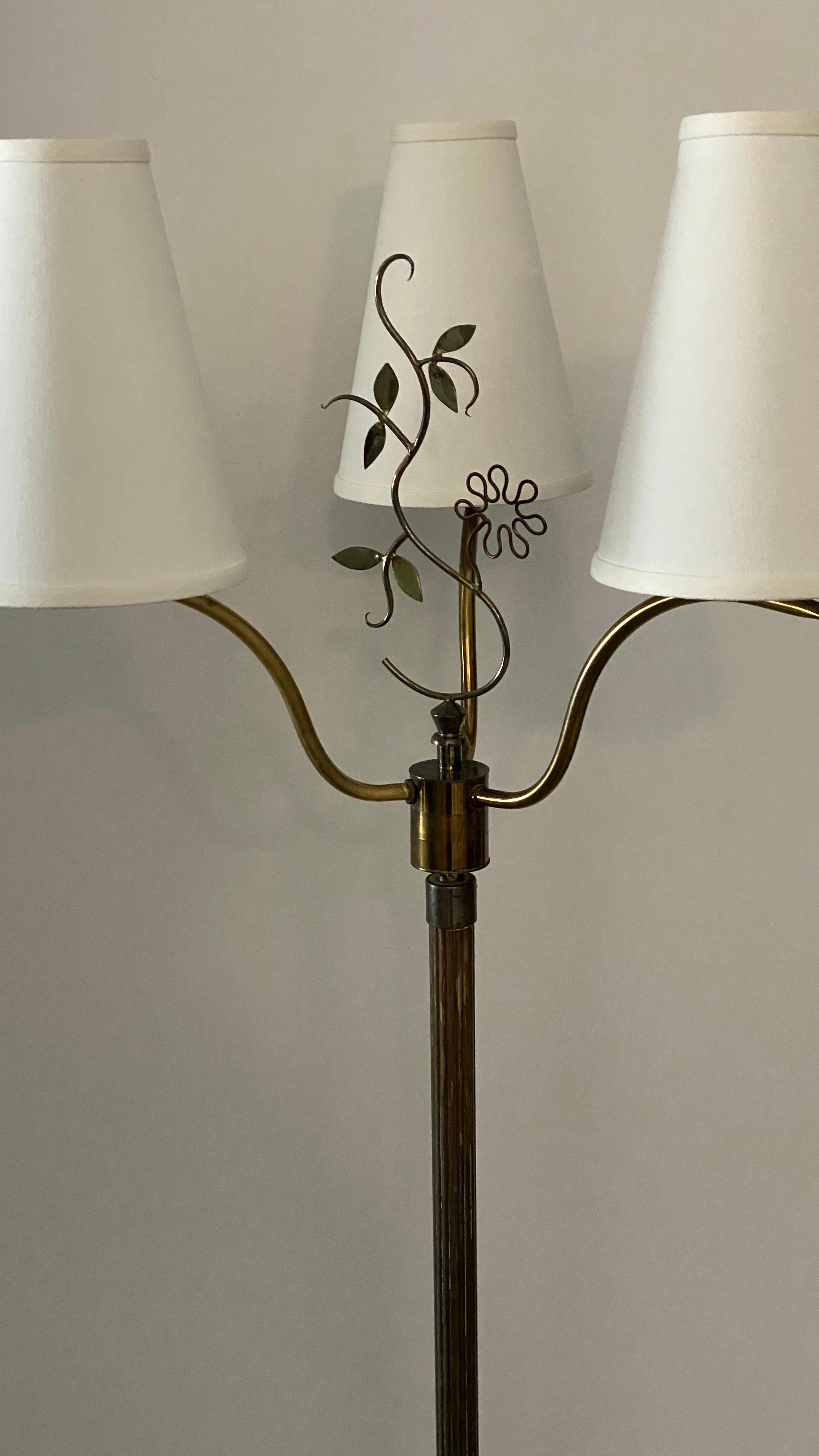 A two armed organic floor lamp. By an unknown Swedish designer and maker. In brass. 

Stated dimensions are without lampshade. Lampshades are not included in purchase.

Other designers working in the organic style include Jean Royere, Alvar