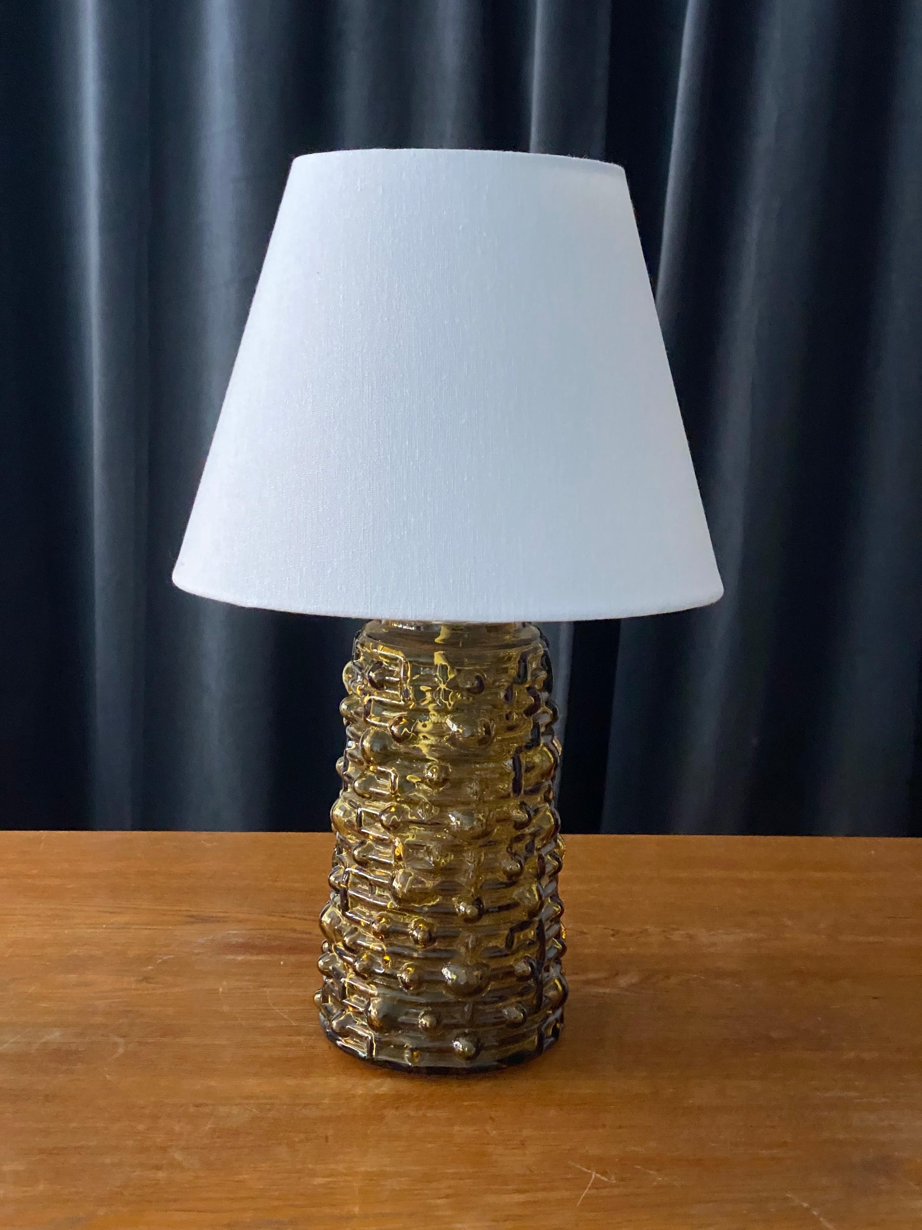 A highly modernist organic table lamp. Of Swedish production. In blown glass, 1950s. Sold without lampshade.

Other designers of the period include Paavo Tynell, Josef Frank, Lisa Johansson-Pape, and Alvar Aalto.
