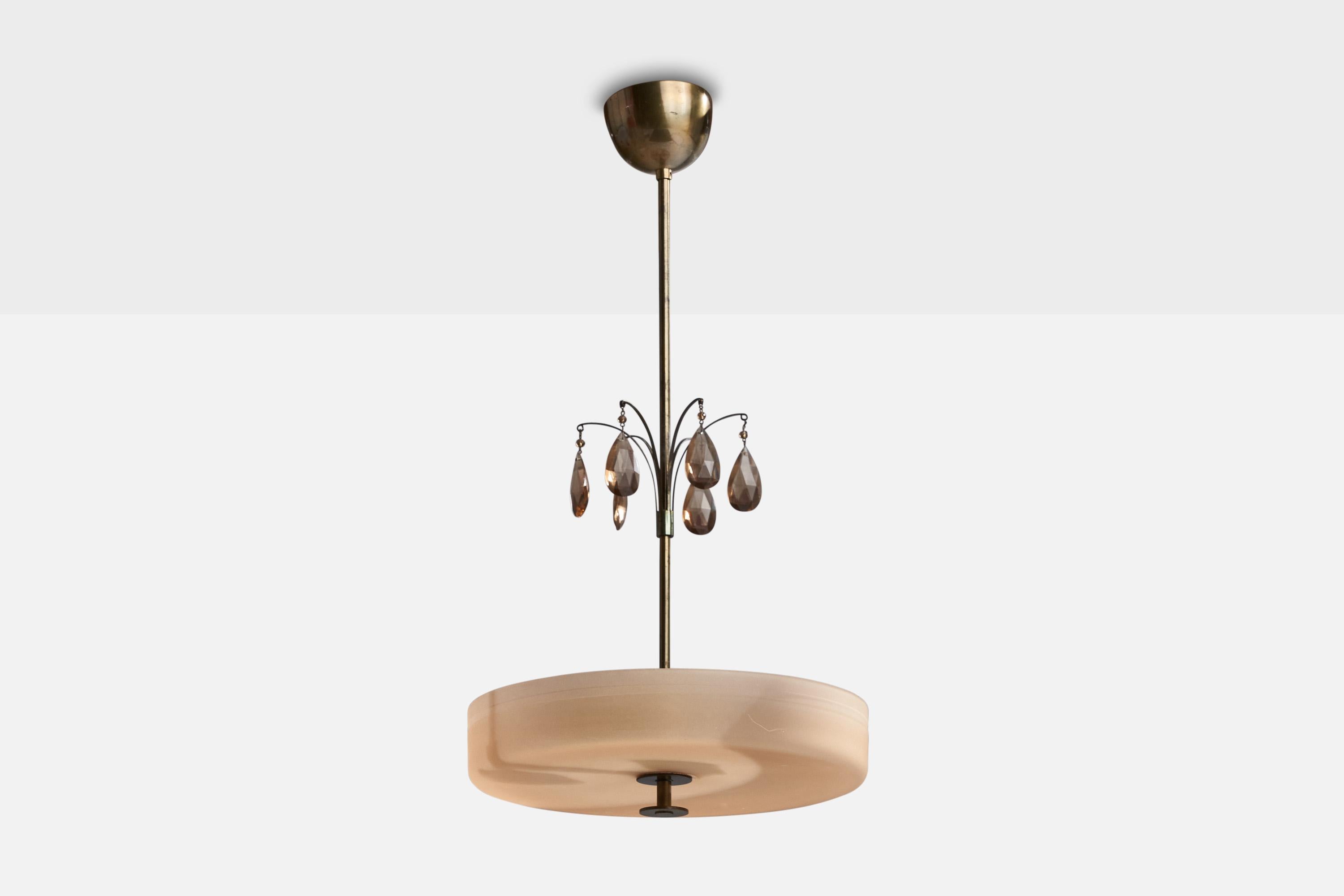 A brass and glass pendant light designed and produced in Sweden, 1930s.

Dimensions of canopy (inches): 3.25” H x 4” Diameter
Socket takes standard E-26 bulbs. 2 sockets.There is no maximum wattage stated on the fixture. All lighting will be