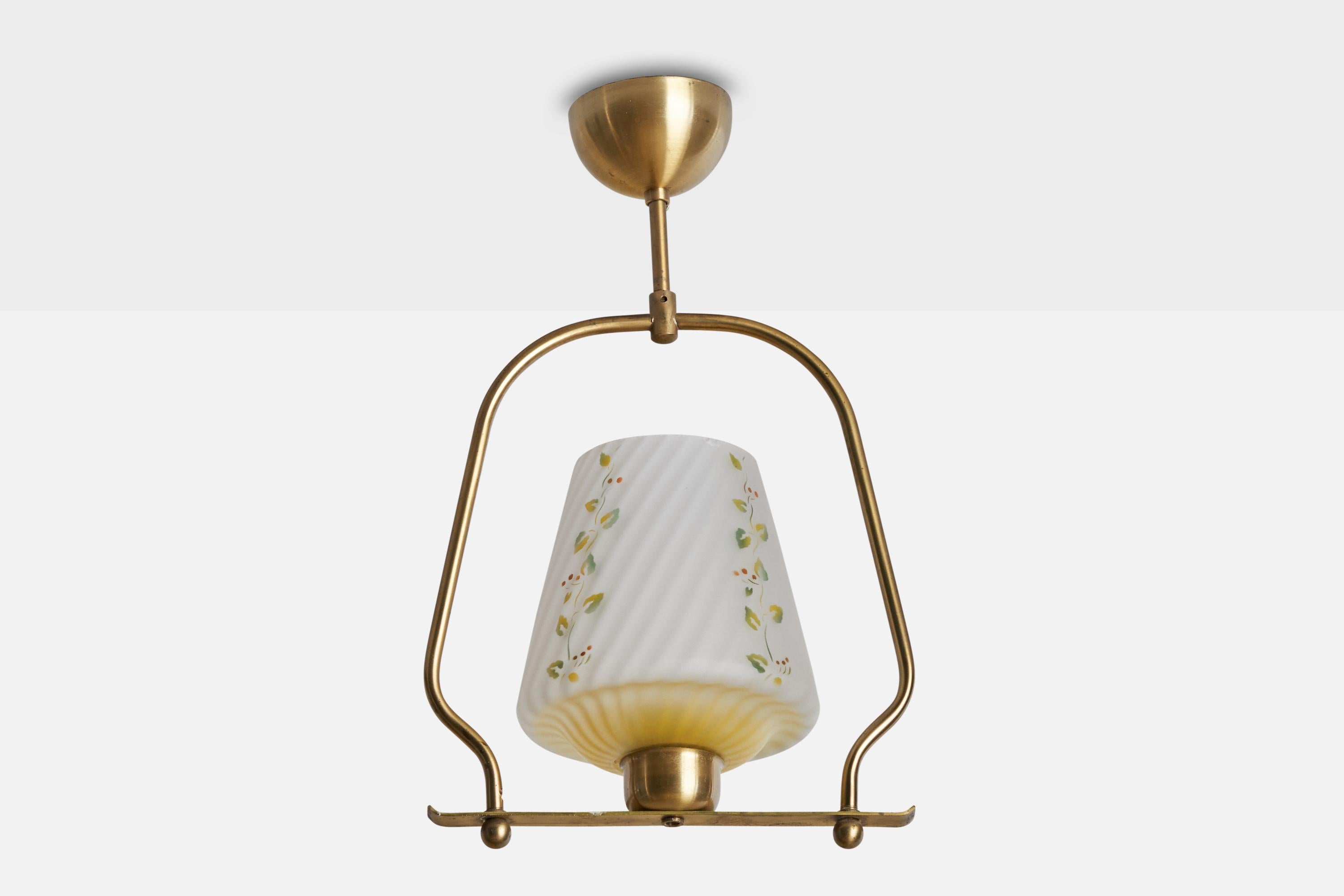 A brass and white floral printed glass pendant light designed and produced in Sweden, c. 1940s.

Dimensions of canopy (inches): 2”  H x 3.5” Diameter
Socket takes standard E-26 bulbs. 1 socket.There is no maximum wattage stated on the fixture. All