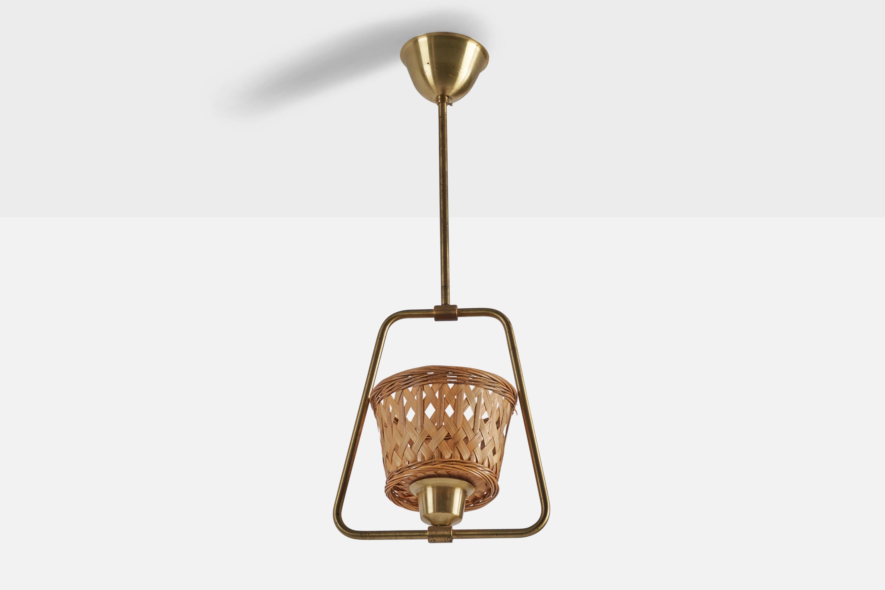 
A brass and rattan pendant light designed and produced in Sweden, c. 1940s.
Overall Dimensions (inches): 33.5” H x 9” W x 6.35” D
Bulb Specifications: E-26 Bulb
Number of Sockets: 1
All lighting will be converted for US usage. We are unable to