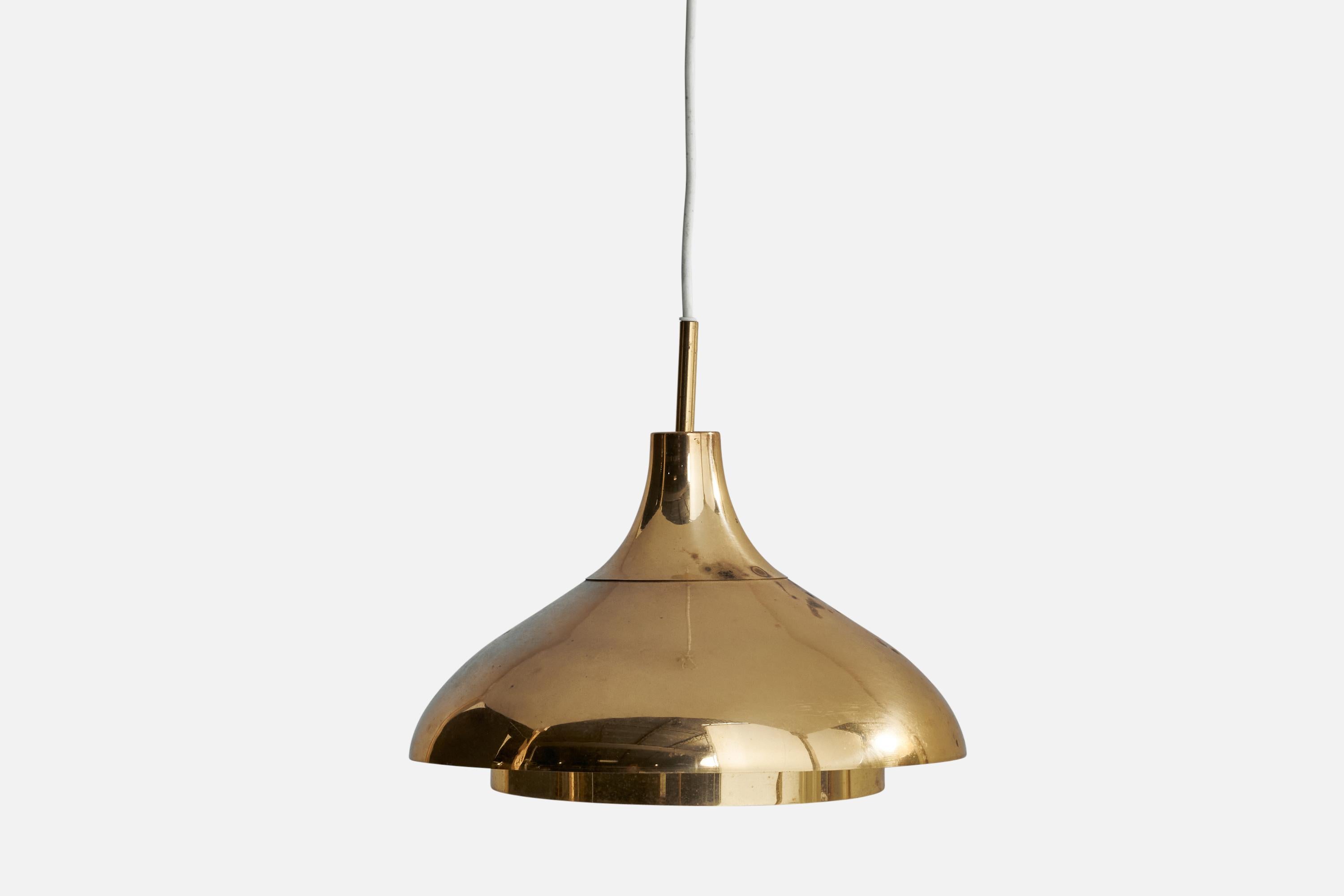 A brass pendant light designed and produced in Sweden, c. 1950s.

Dimensions of canopy (inches): n/a
Socket takes standard E-26 bulb. 1 socket.There is no maximum wattage stated on the fixture. All lighting will be converted for US usage. We are