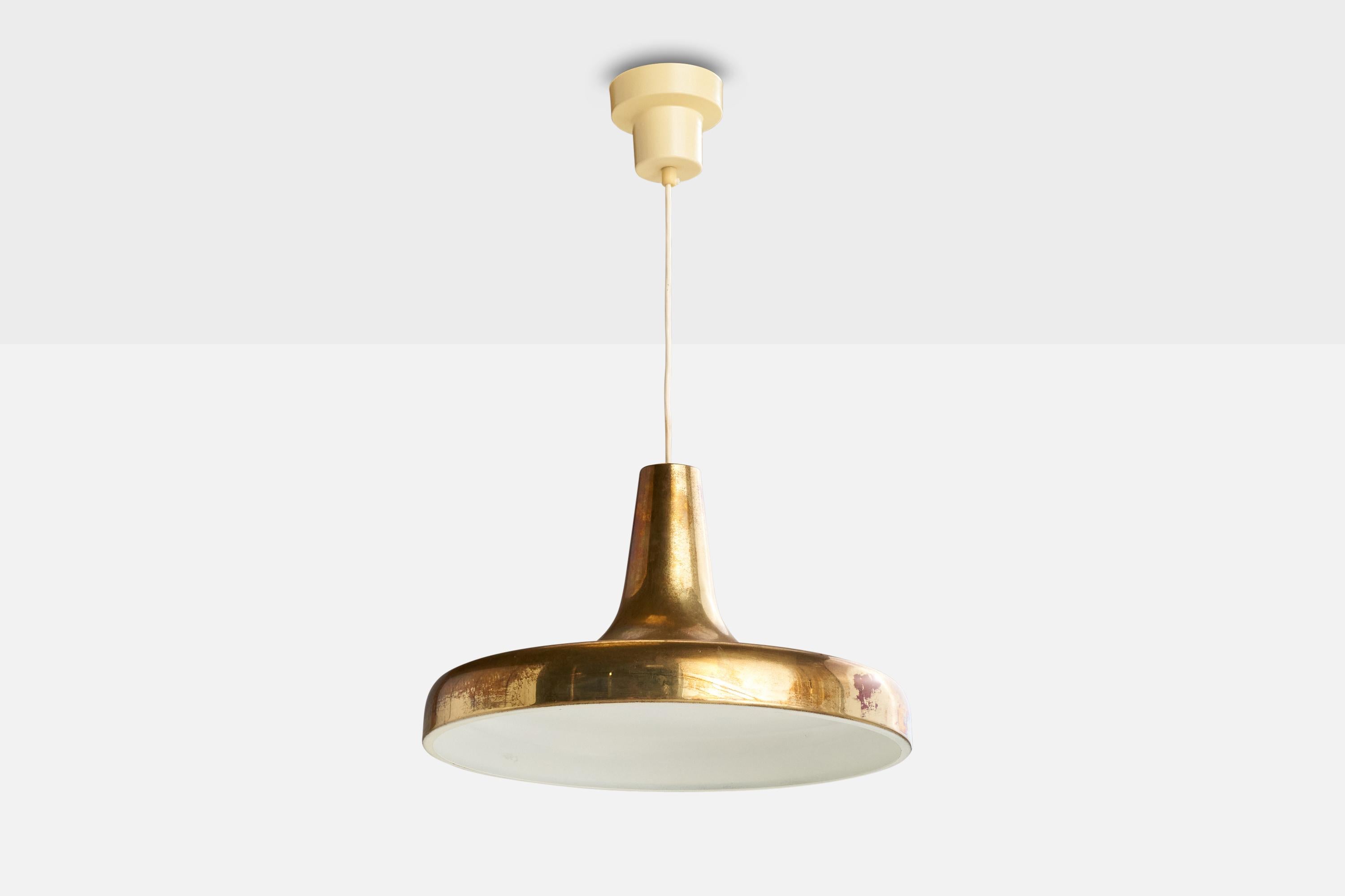 Una lampada a sospensione in ottone progettata e prodotta in Svezia, negli anni '50.

Dimensioni del baldacchino (pollici): 3,90