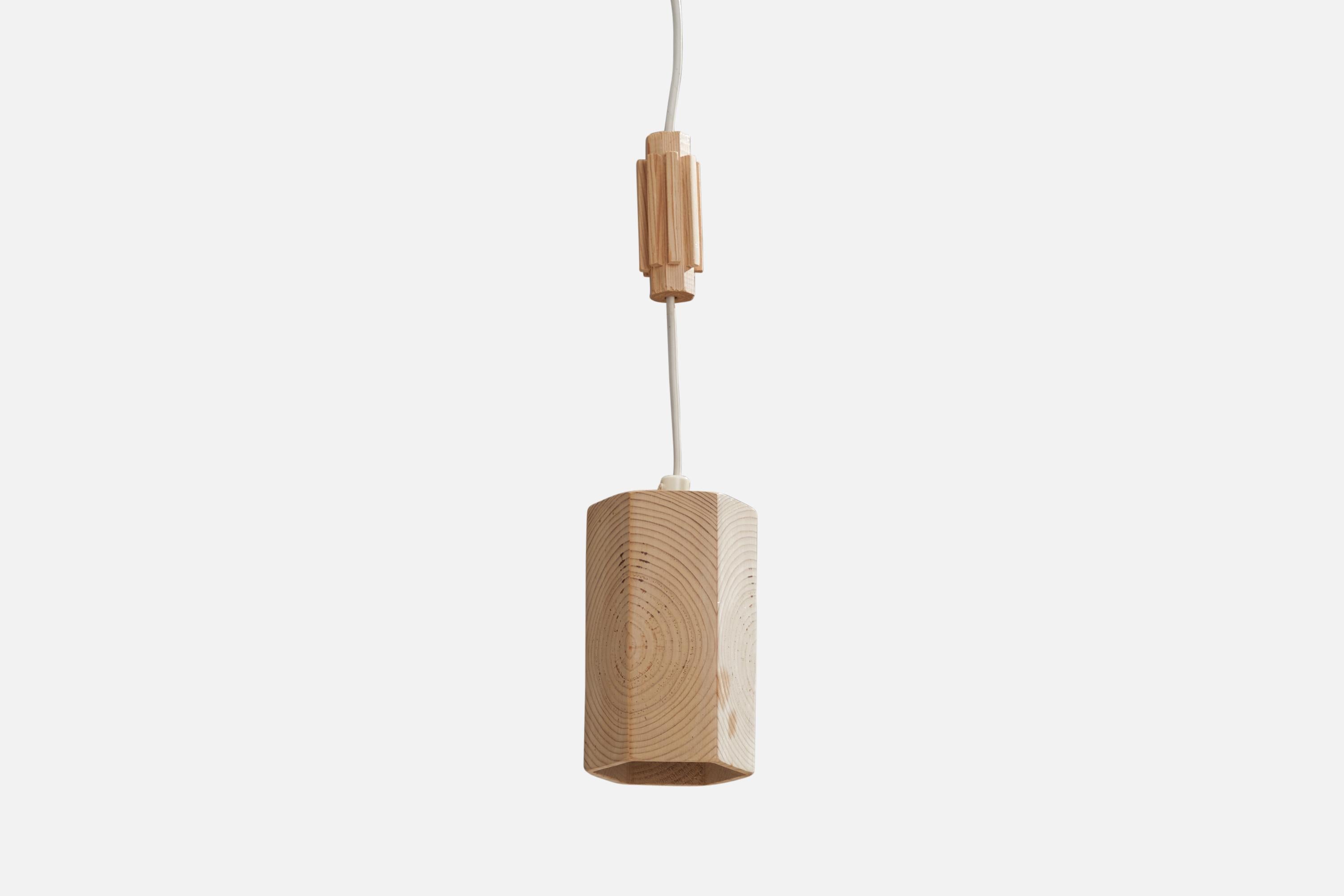 A pine pendant light designed and produced in Sweden, 1970s.

Dimensions of canopy (inches): N/A
Socket takes standard E-14 bulbs. 1 socket.There is no maximum wattage stated on the fixture. All lighting will be converted for US usage. We are unable