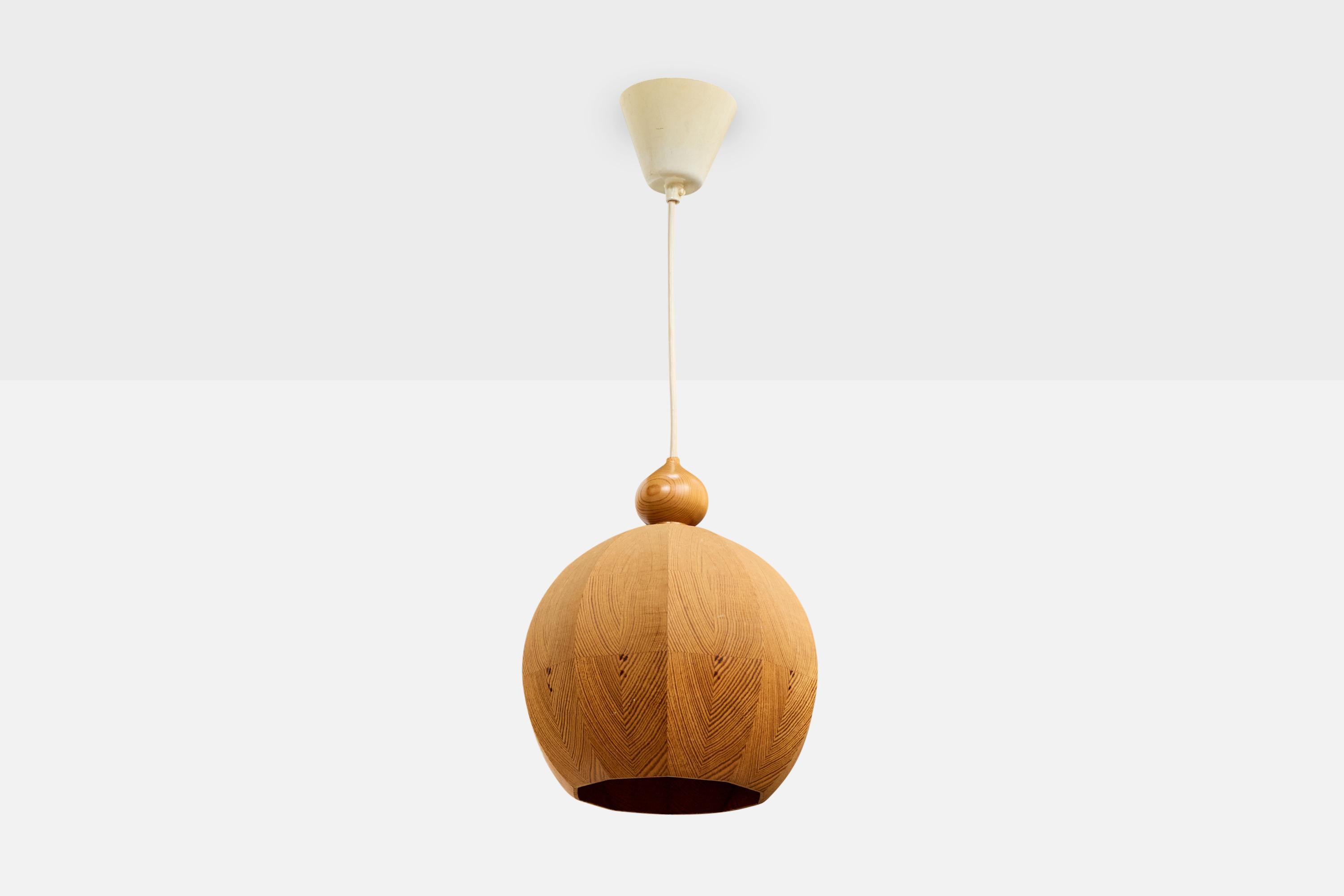 A pine pendant light designed and produced in Sweden, c. 1970s.

Overall Dimensions (inches): 22.25