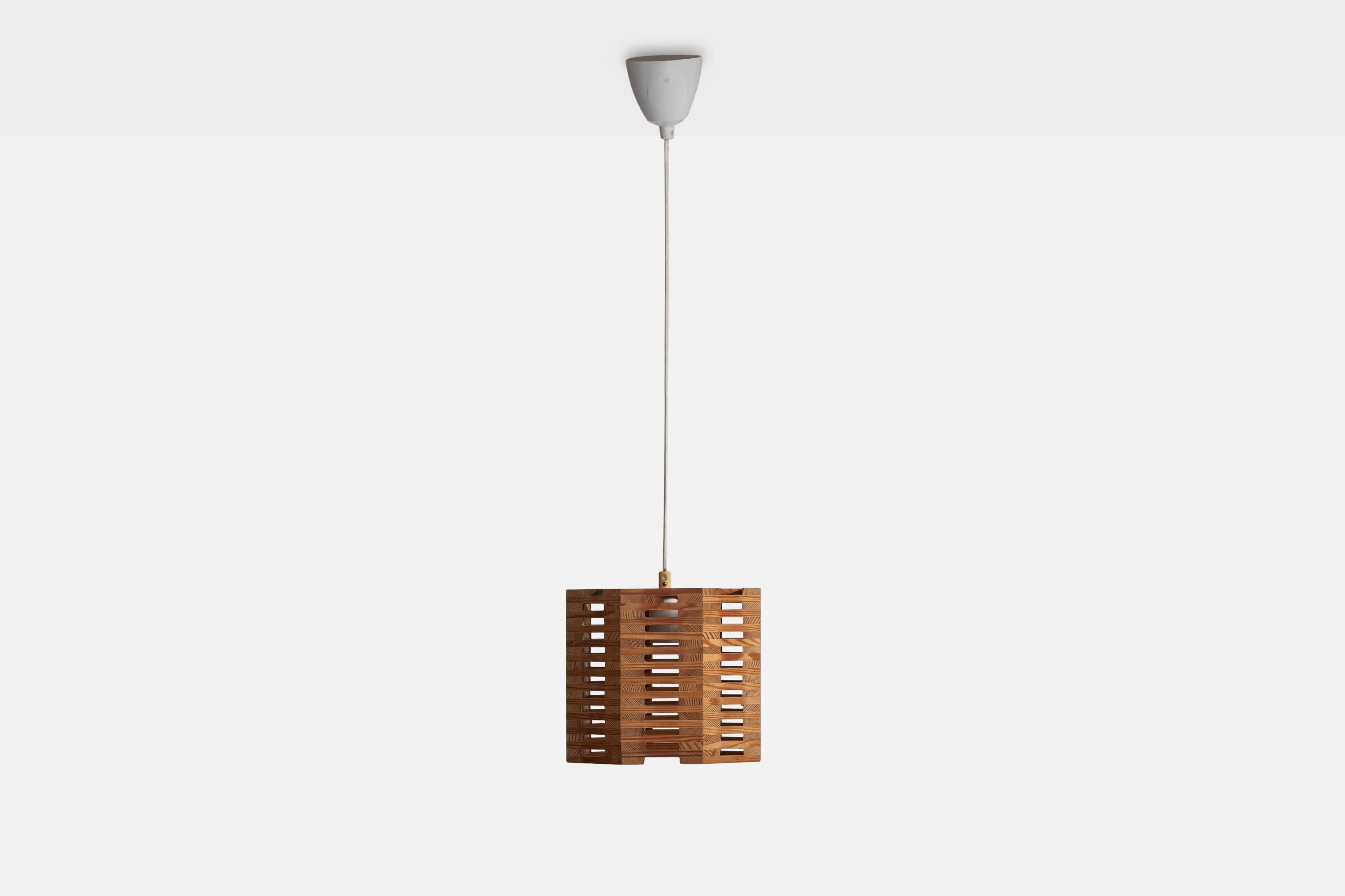 A pine pendant designed and produced in Sweden, 1970s.

Dimensions of canopy (inches): 3.75” H x 3.5” Diameter
Socket takes standard E-26 bulbs. 1 socket.There is no maximum wattage stated on the fixture. All lighting will be converted for US usage.