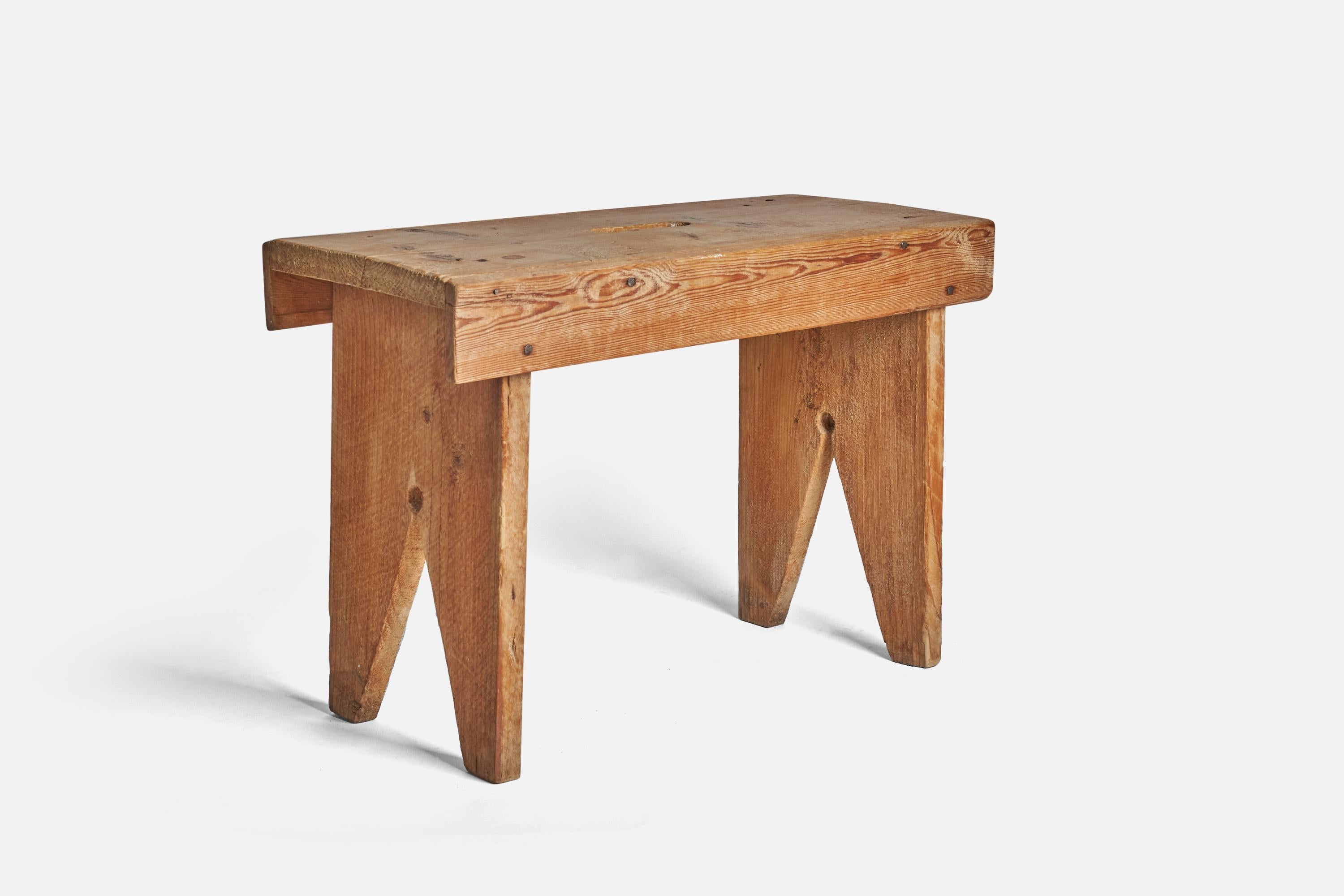 A solid pine stool designed and produced in Sweden, 1960s. 