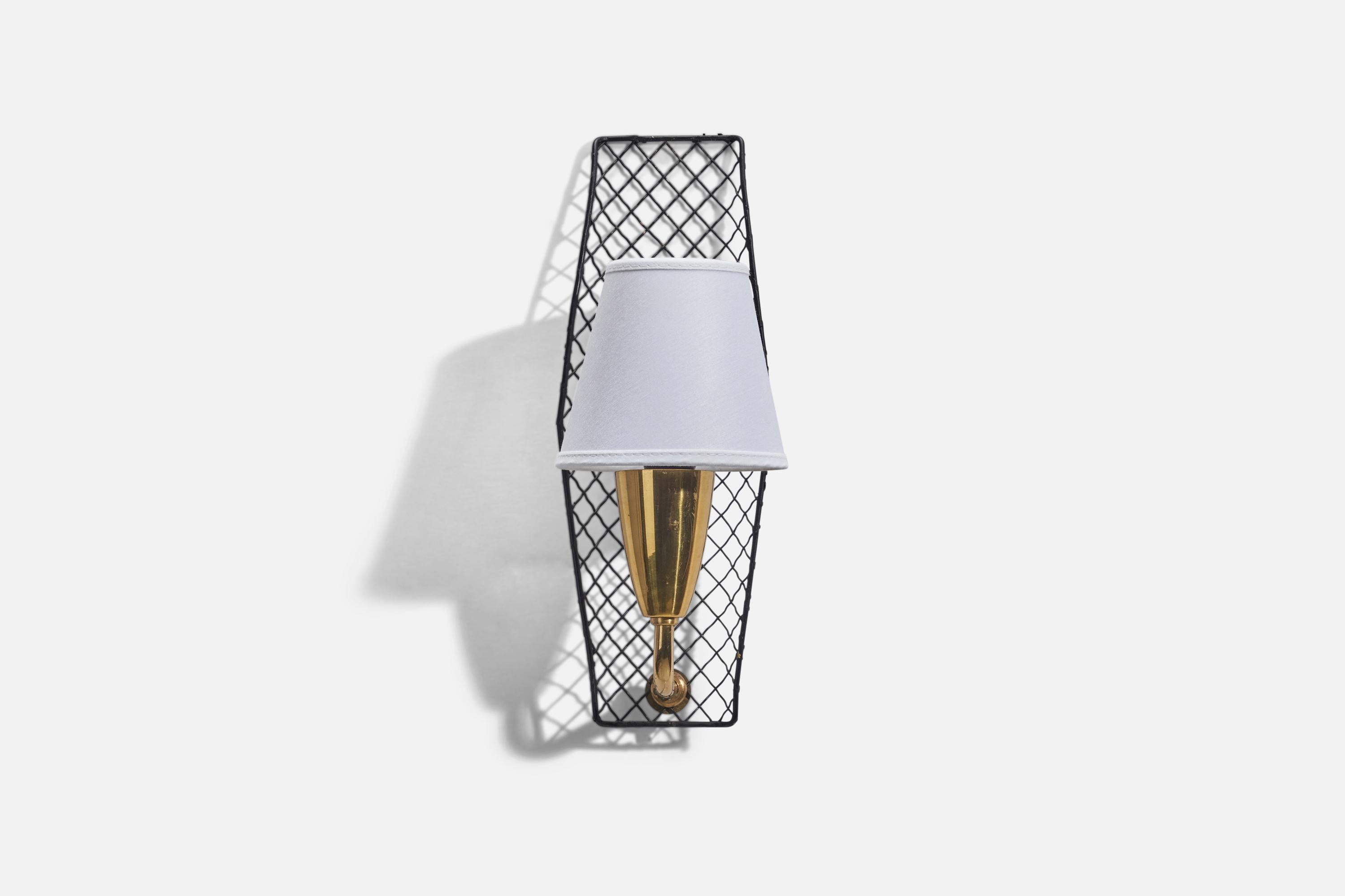 A brass, black lacquered metal and fabric sconce designed and produced in Sweden, 1950s.

Sold with Lampshade. Dimensions stated are of Sconce with Lampshade. Note lamp is configured for plug in.

Socket takes E-14 bulb.

There is no maximum