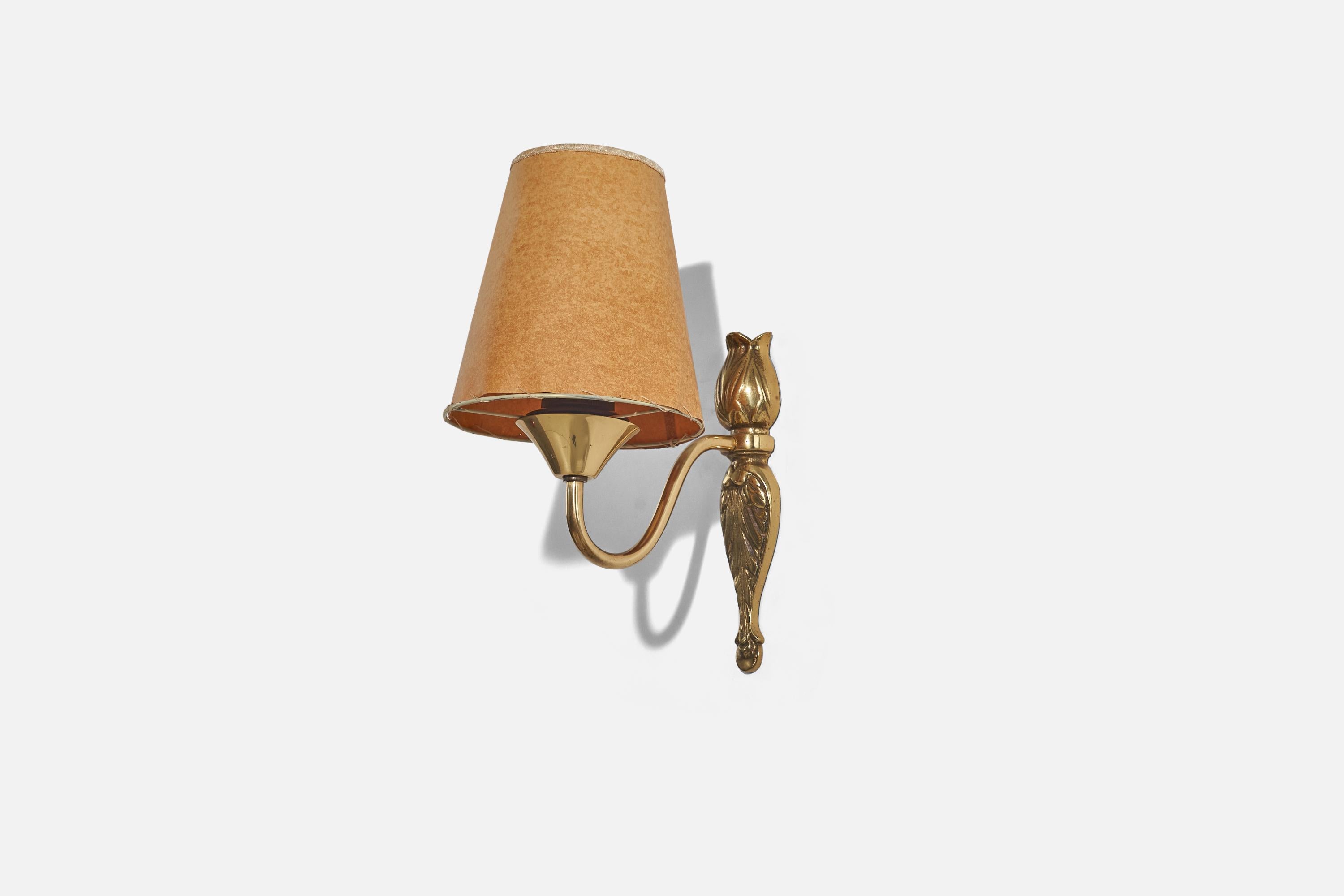 A brass and paper sconce designed and produced in Sweden, c. 1940s.

Sold with Lampshade. 
Stated dimensions refer to the Sconce with the Shade. 
Dimensions of back plate (inches) : 8.18 x 1.9 x 1.14 (Height x Width x Depth).

Socket takes standard
