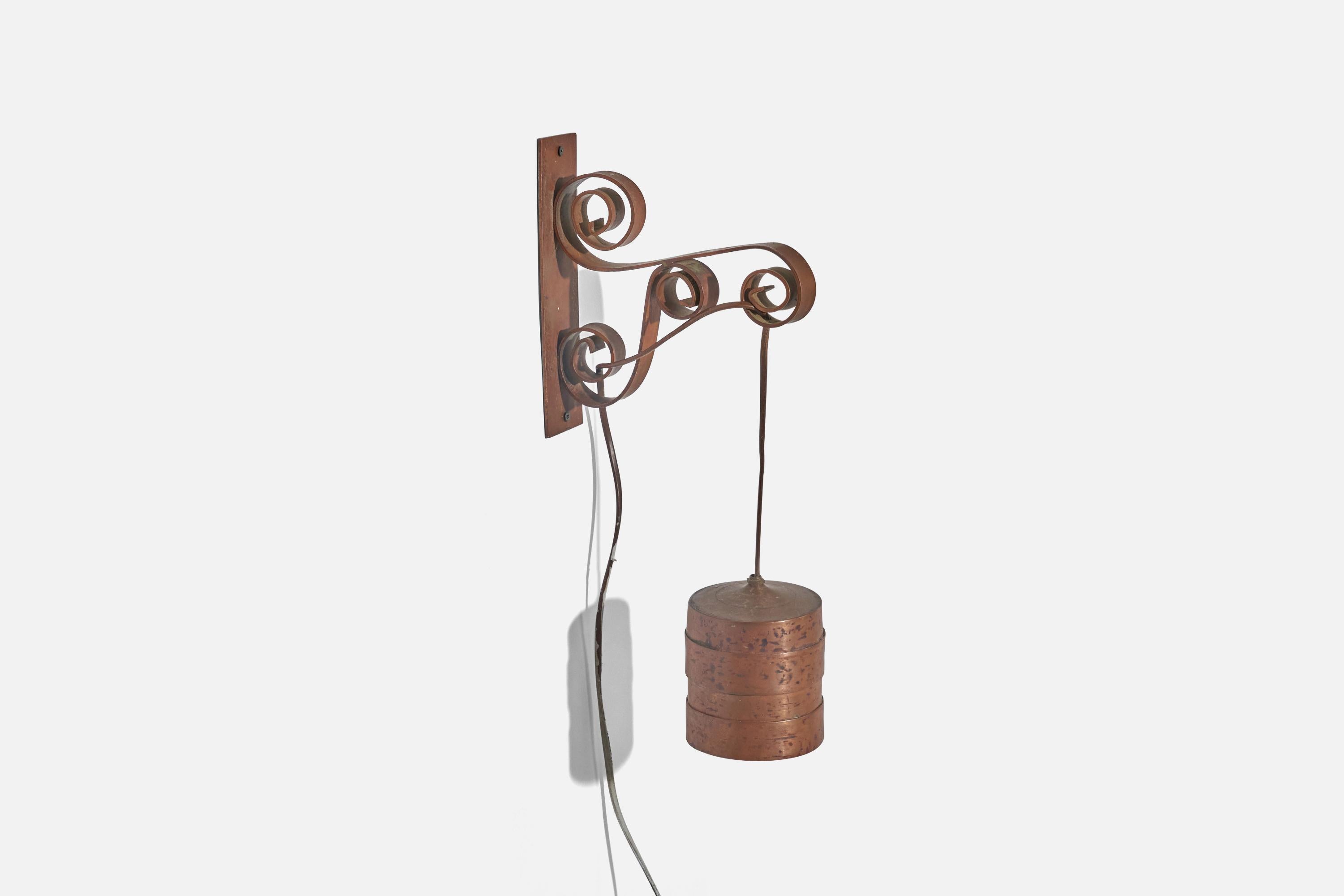 A copper sconce/ wall light designed and produced in Sweden, c. 1940s.

Dimensions variable, measured as illustrated in first image.

Socket takes E-14 bulb.

There is no maximum wattage stated on the fixture.

Dimensions of Back Plate