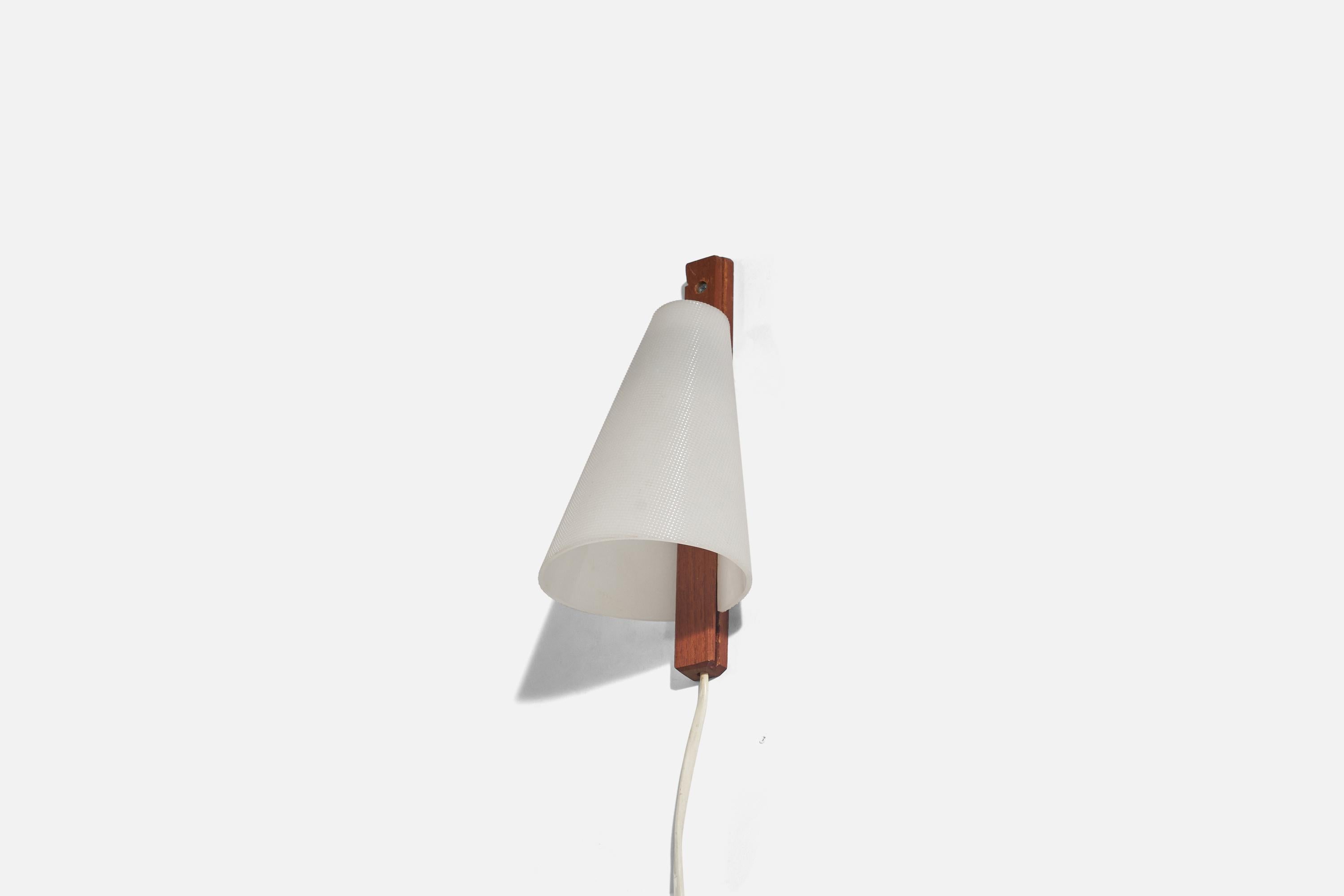 A teak and acrylic sconce designed and produced in Sweden, c. 1960s.

Sold with lampshade. 
Stated dimensions refer to the Sconce with the Shade.