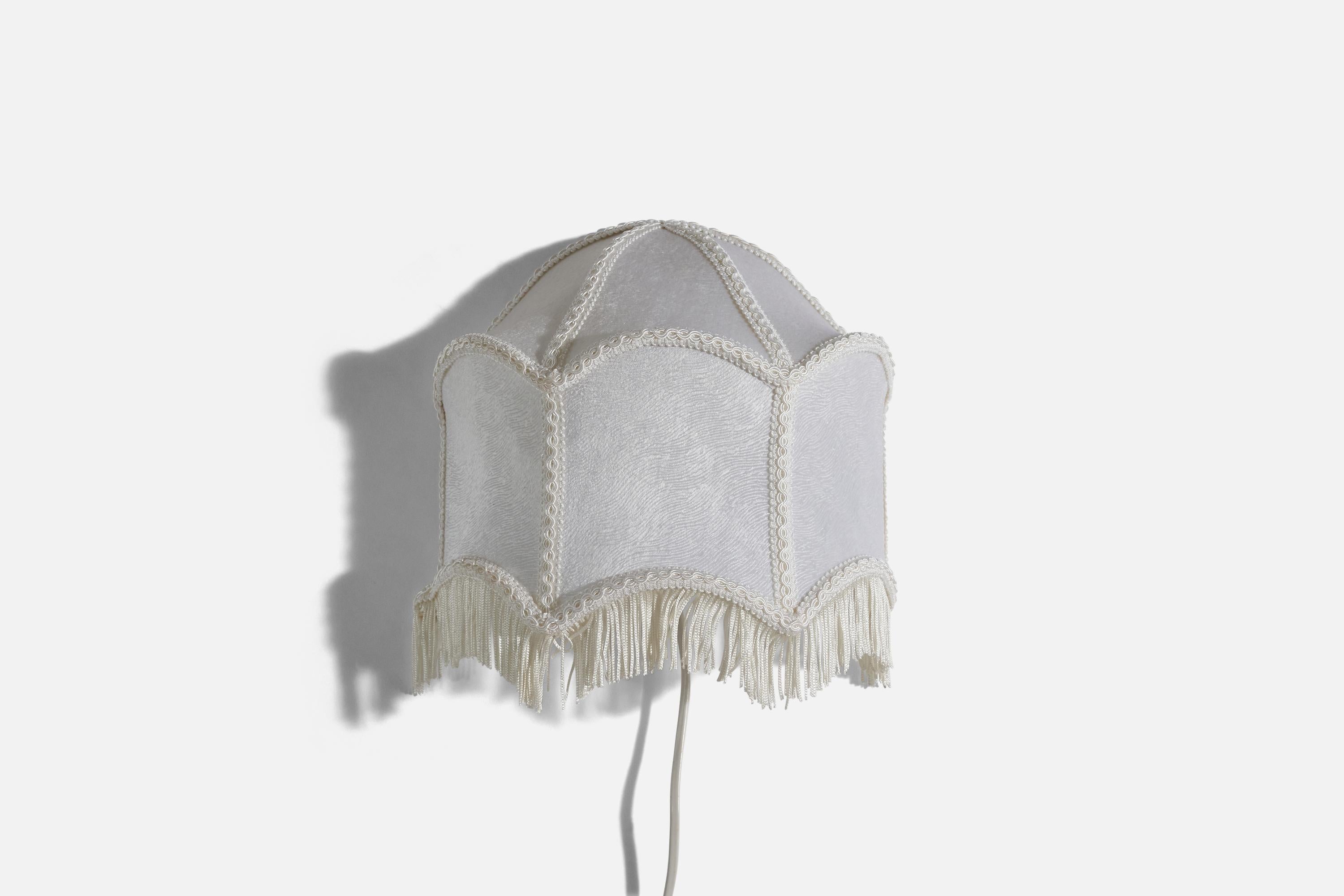 A velvet and metal sconce designed and produced in Sweden, c. 1940s.

