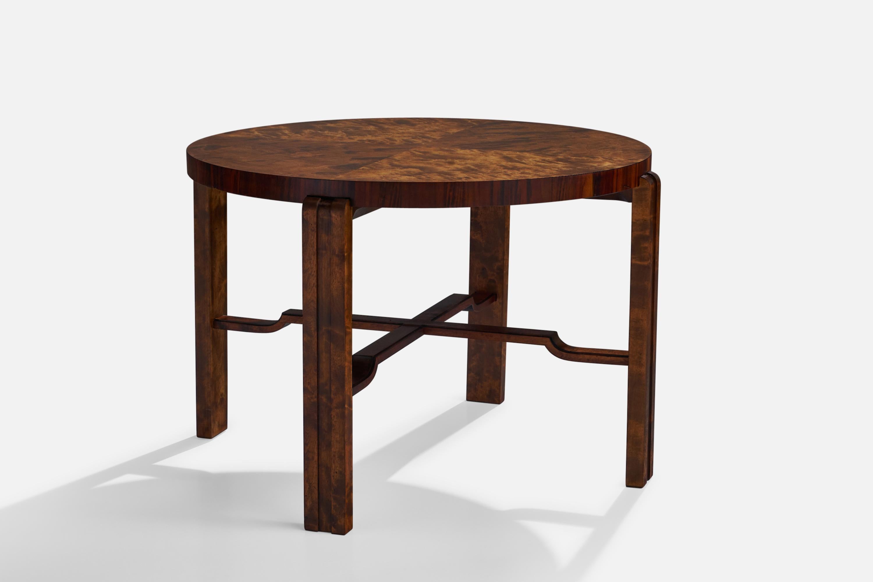 A dark-stained birch side table designed and produced in Sweden, c. 1930s.