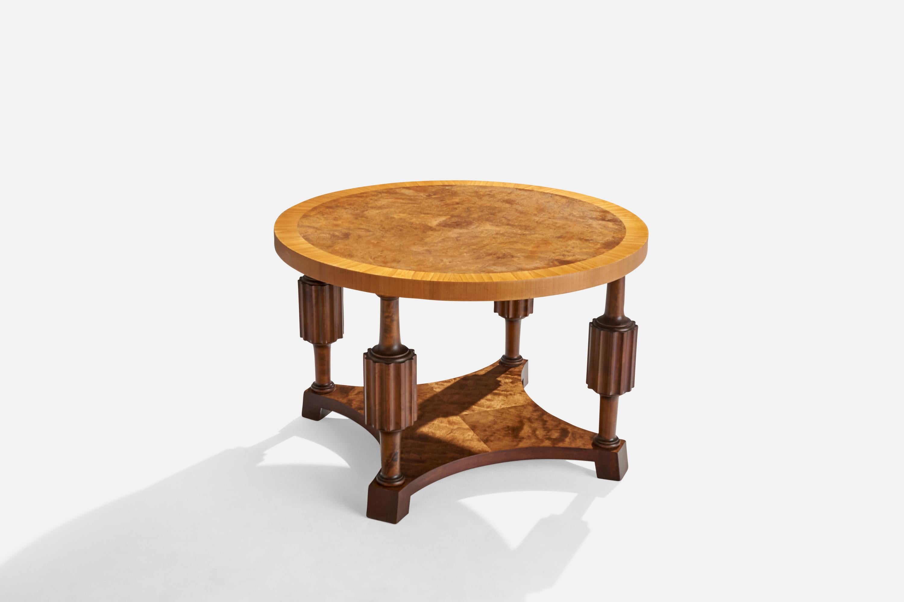A birch side table or coffee table designed and produced in Sweden, c. 1930s.