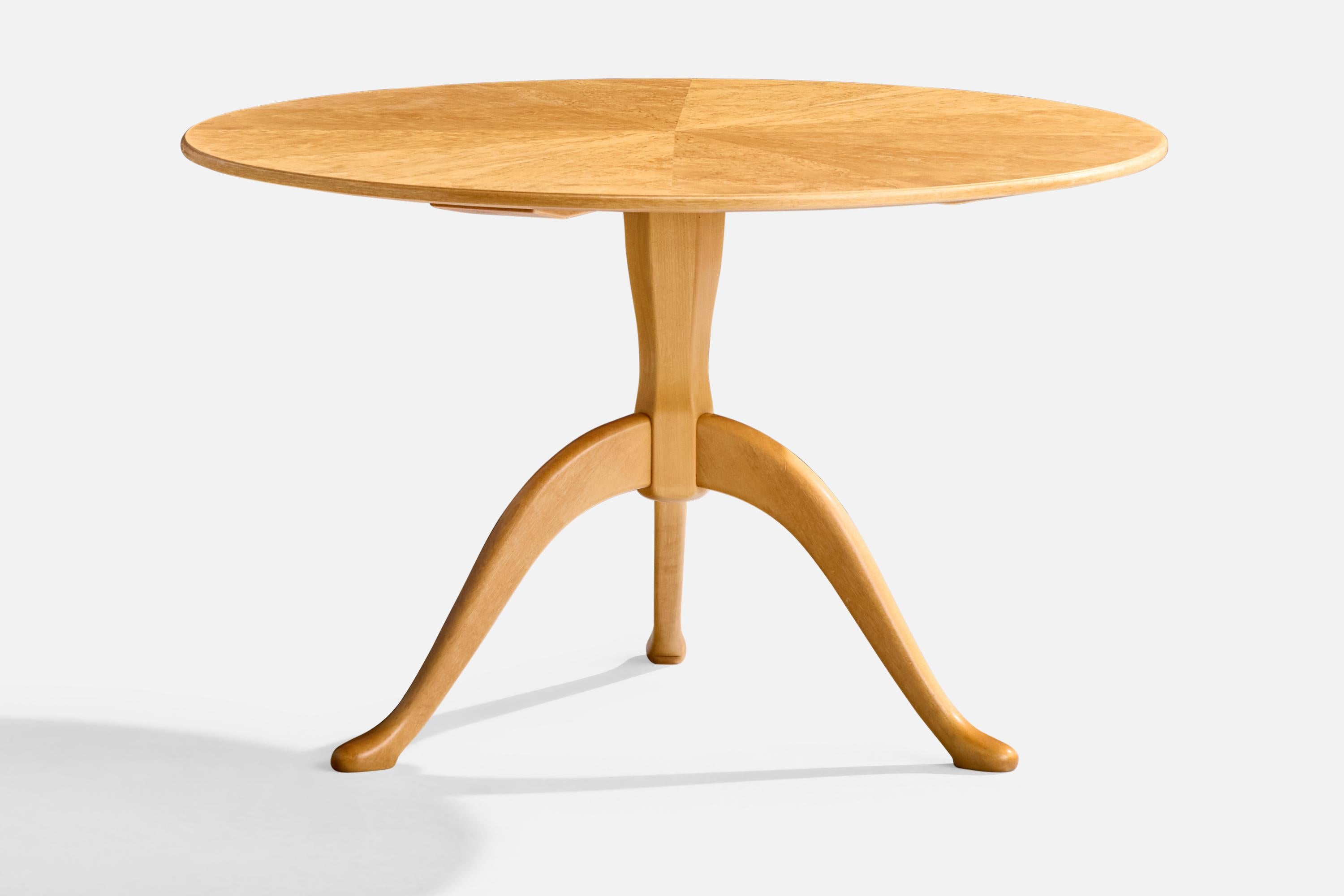 A birch and masur birch side table designed and produced in Sweden, signed 