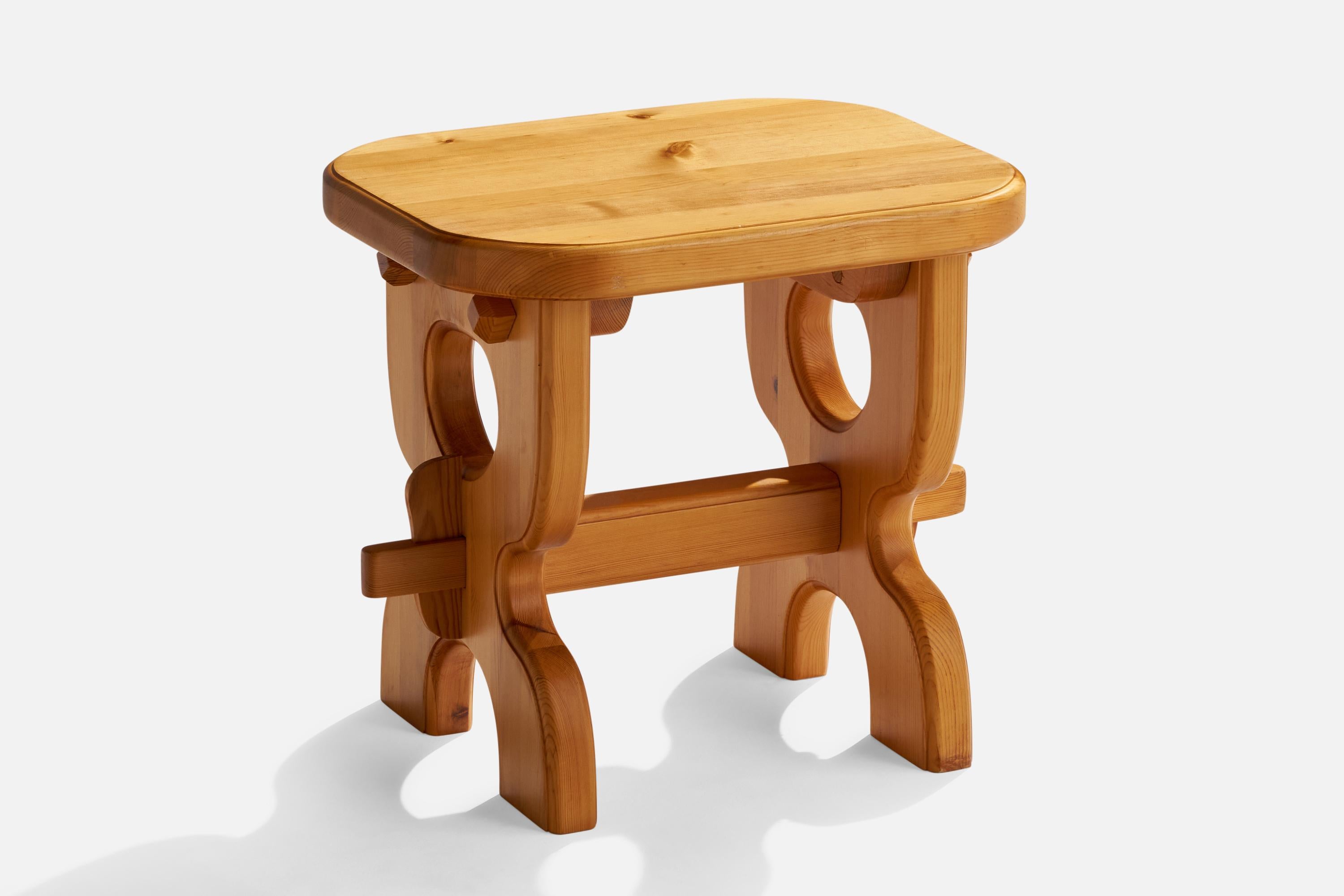 A pine side table or stool designed and produced in Sweden, dated 1996.